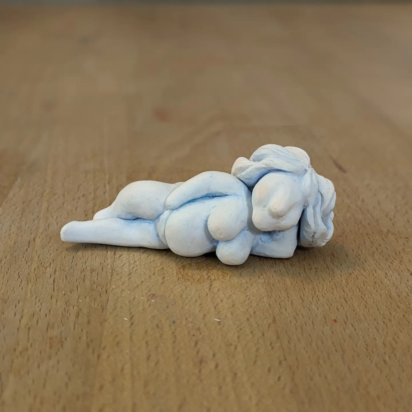 I recently sculpted a fluffy cloud lady #cosclay #polymerclay