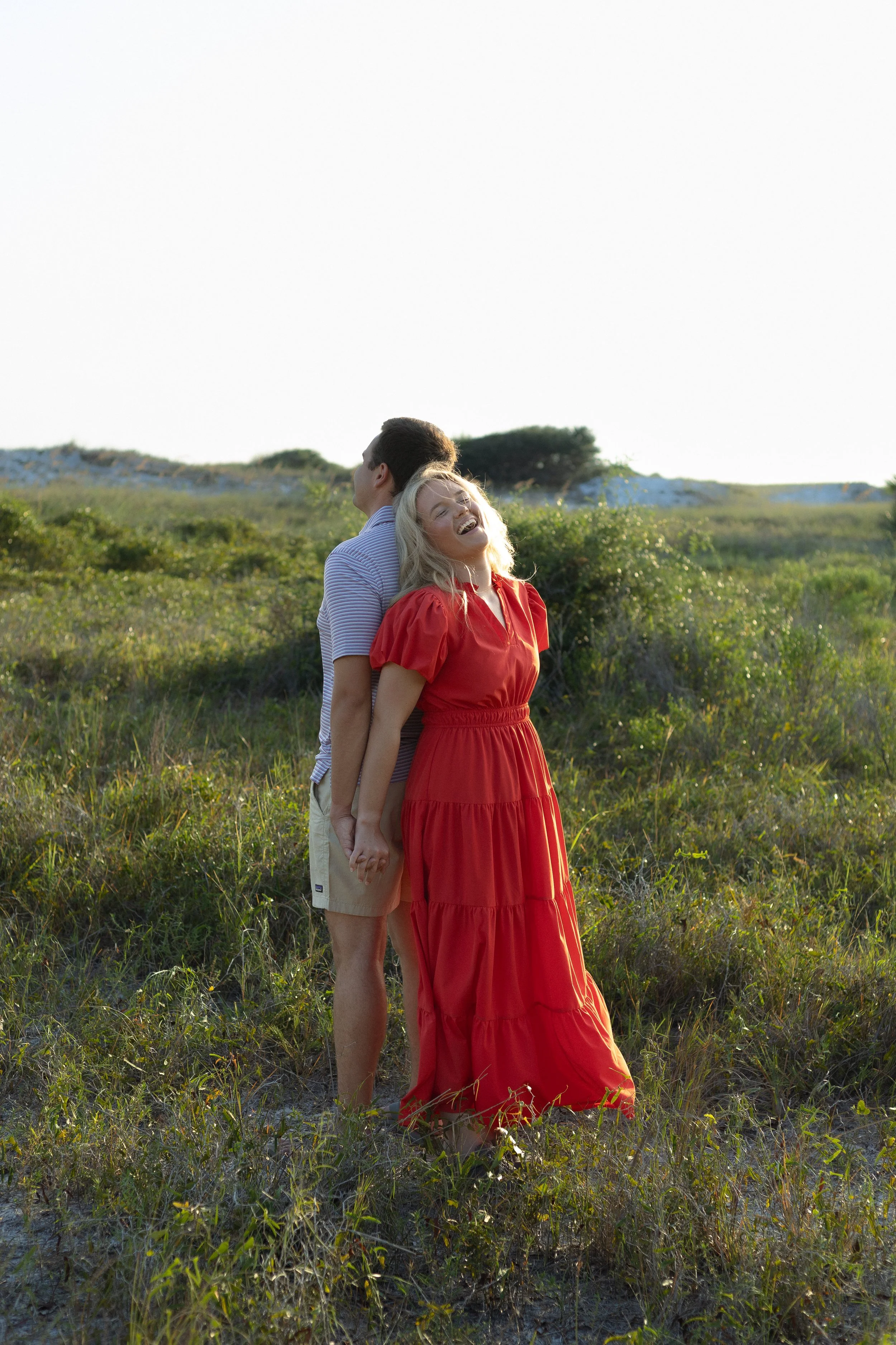 a young couple having engagement photos done by Jordan Hill Photography