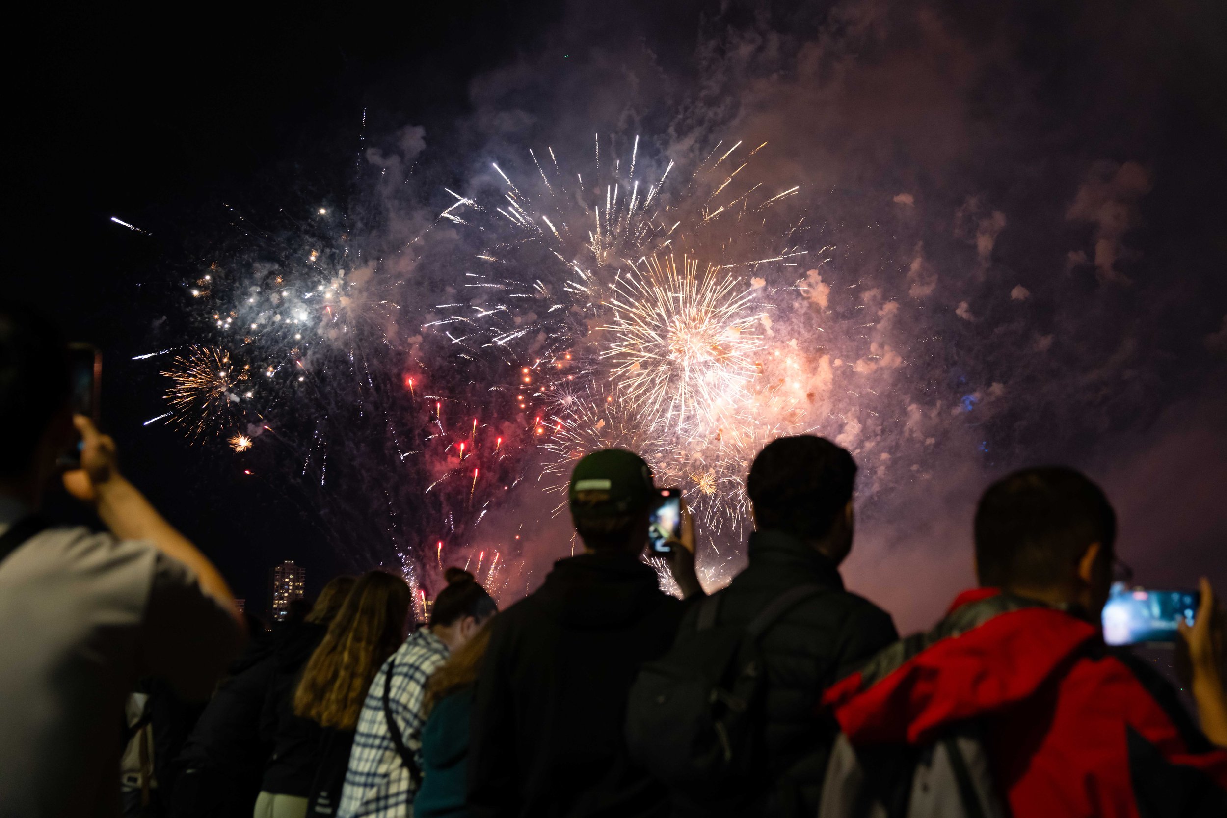 People watching fireworks in Sydney Harbour, Australia