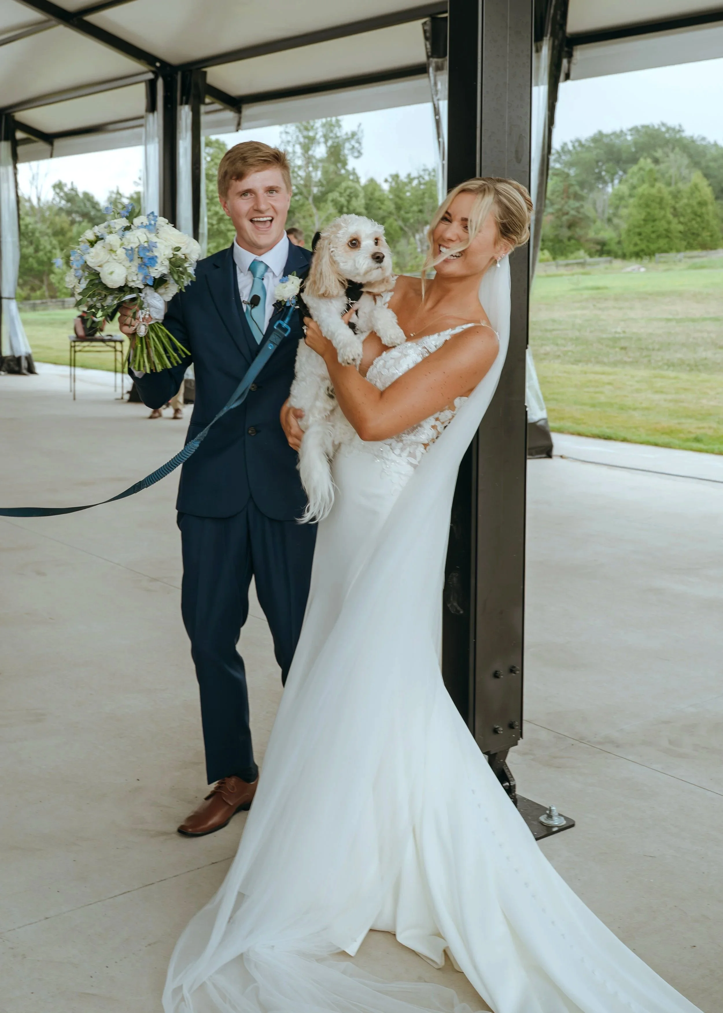 Sydney and Matt share a playful newlywed moment immediately after their ceremony at Gypsy Distillery.