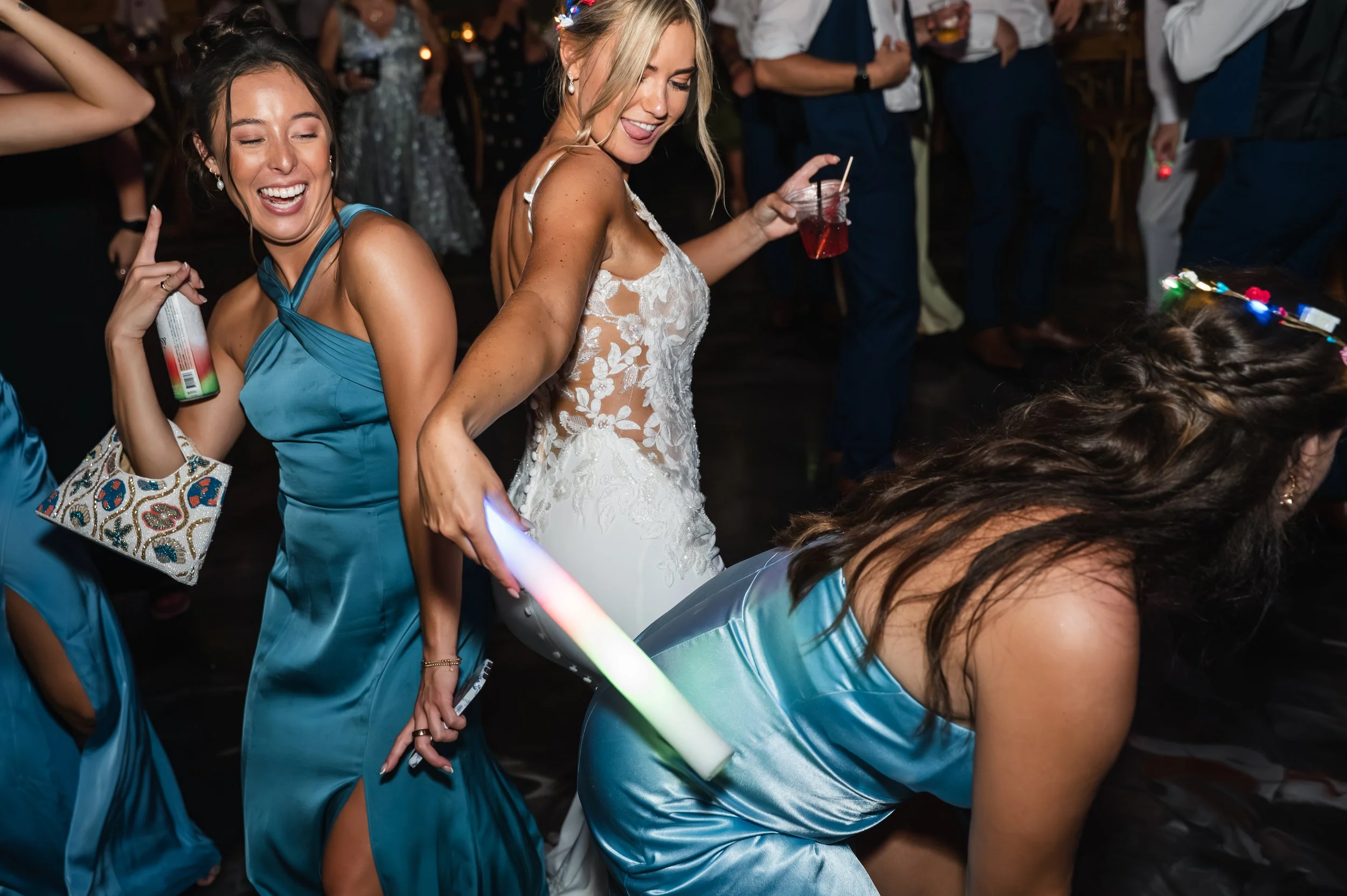 Sydney and Matt dance while wearing light-up halos at their Gypsy Distillery wedding reception.