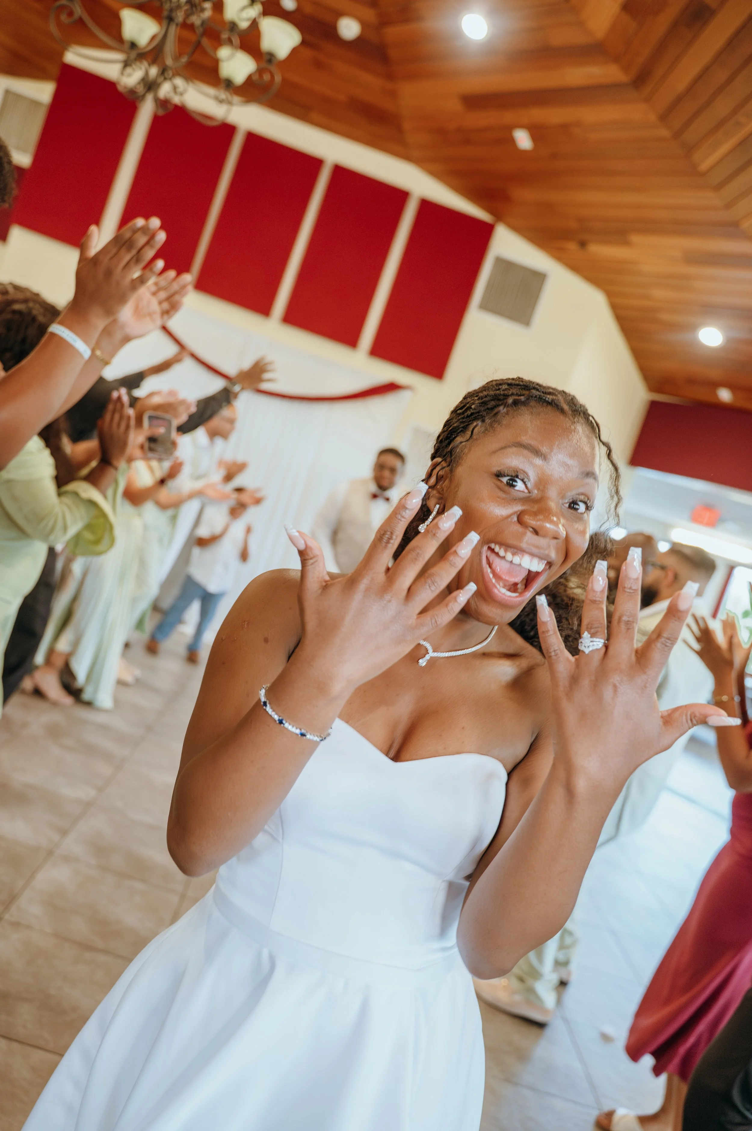Anndi celebrates her wedding day while excitedly showing off her new wedding ring.