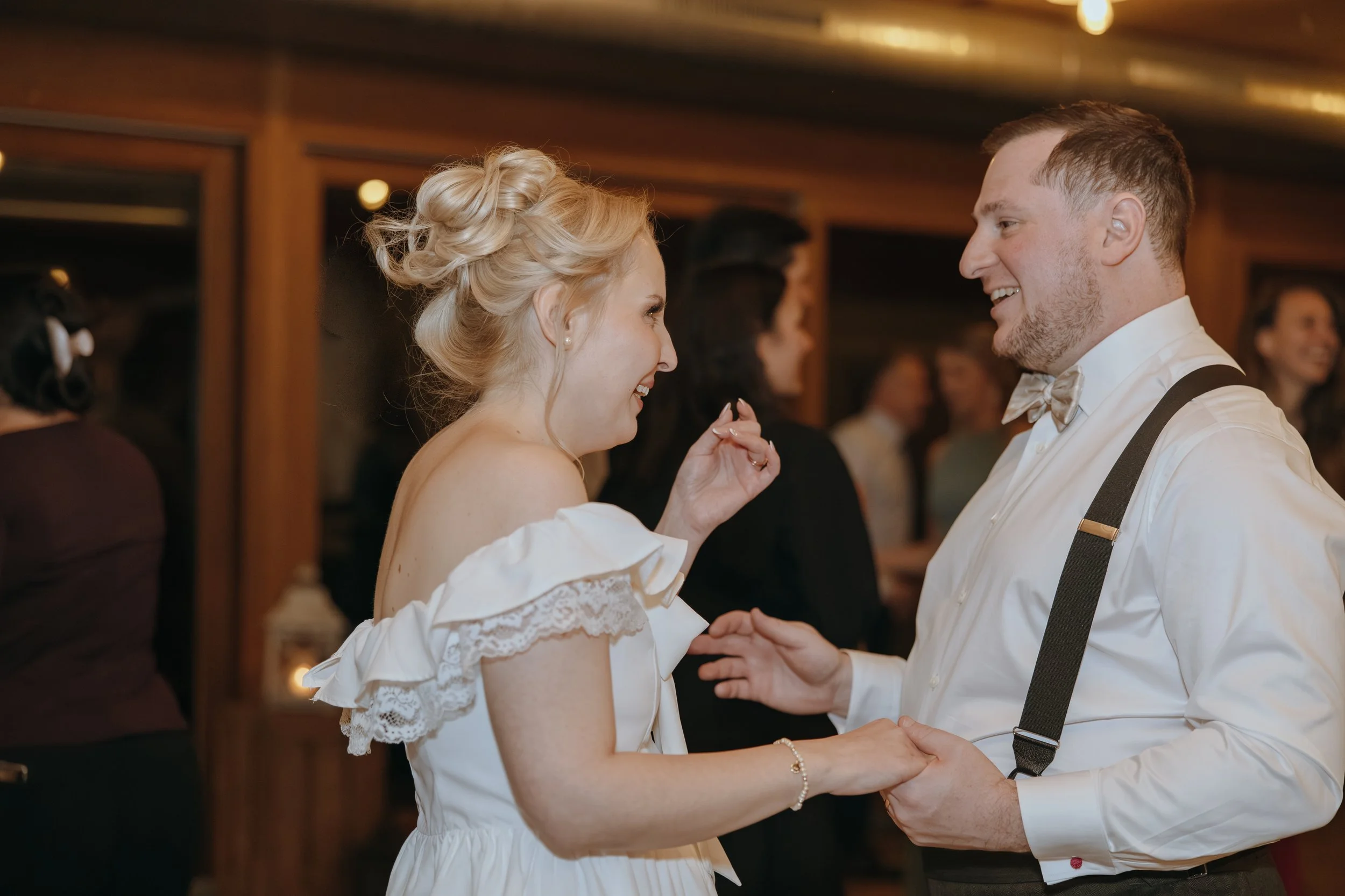 Bride and groom laughing together during their wedding reception in Rapperswil-Jona, Switzerland
