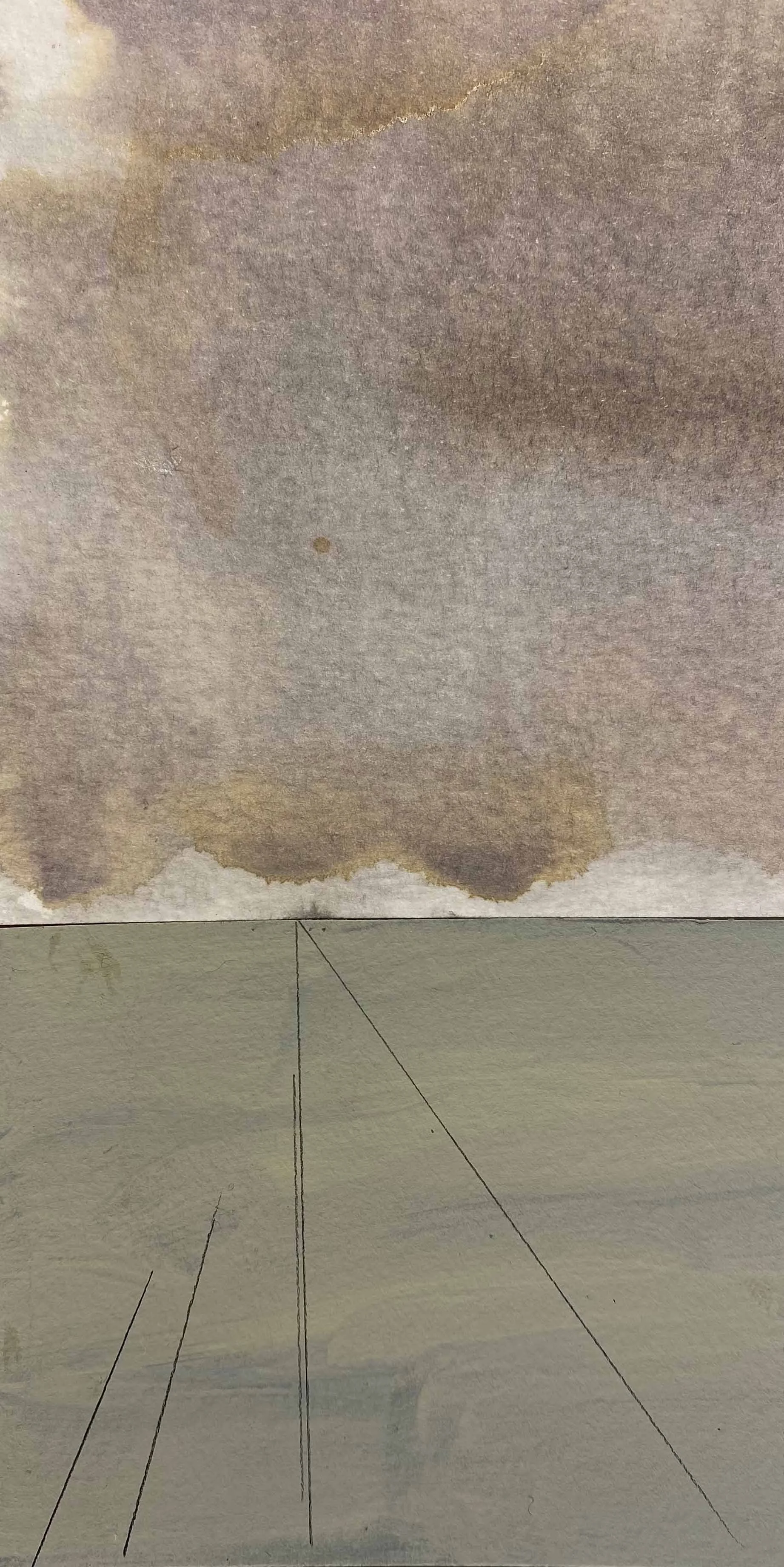 Wet spot stain on a paper ceiling and painted wall, with visible cracks and water damage.