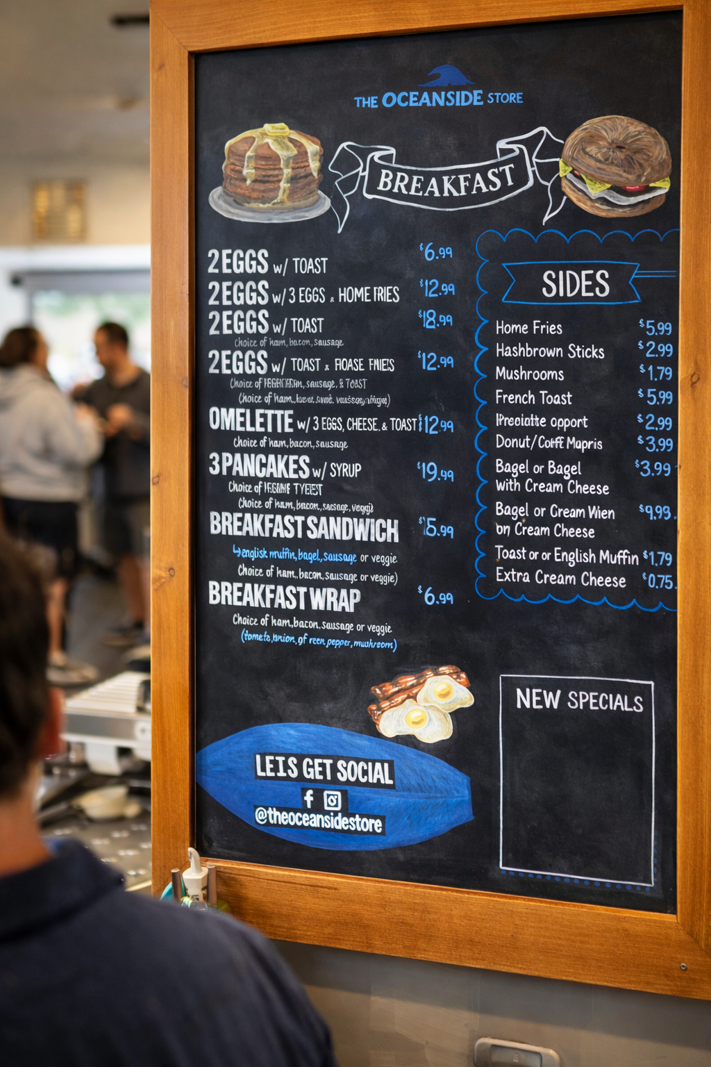 Custom chalkboard menu board installed in a cafe environment demonstrating professional restaurant menu signage designed to guide customer ordering.