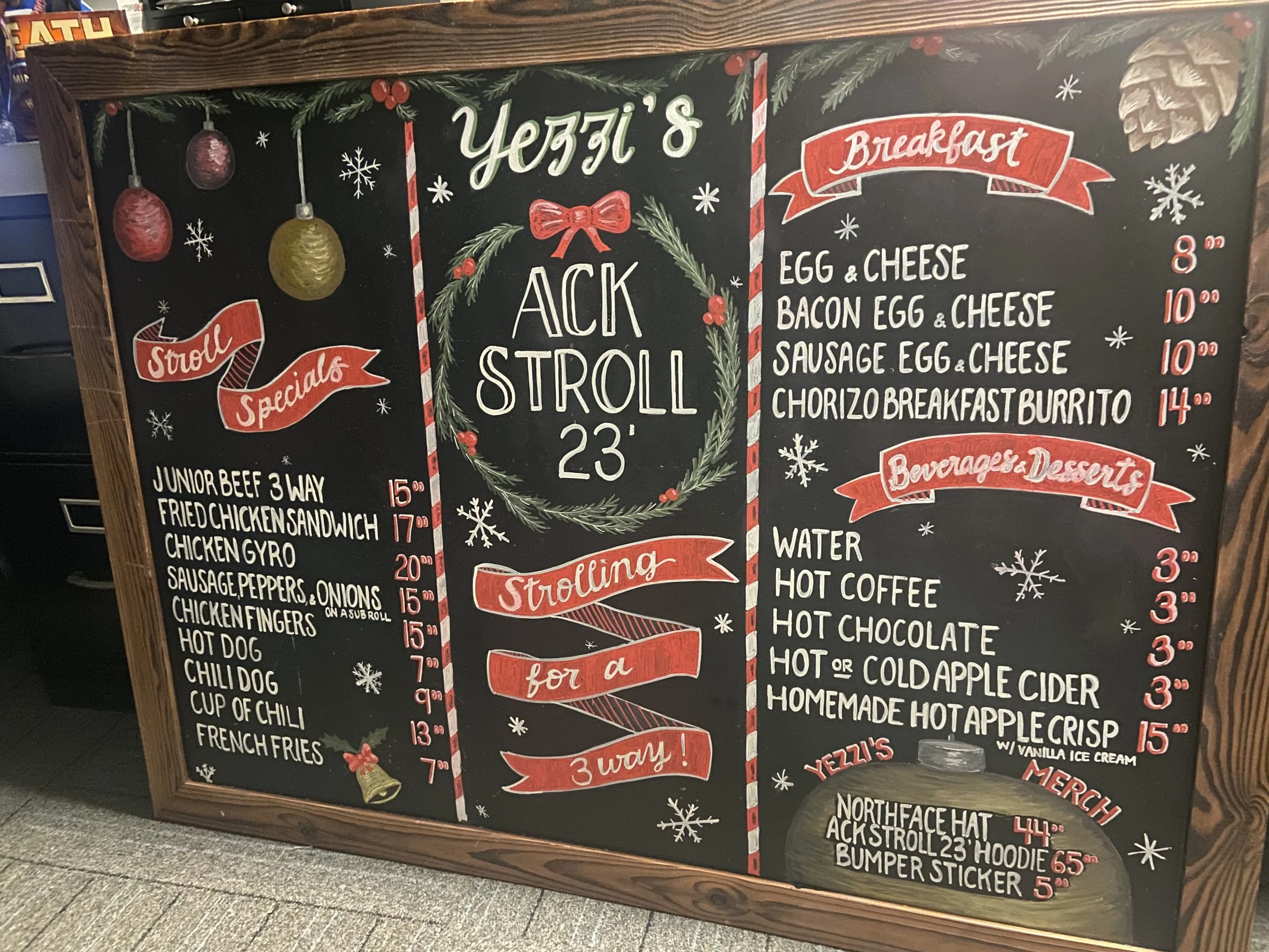Yezzi’s ACK Stroll Alternate Angle. Custom restaurant chalkboard menu with seasonal artwork, clean hierarchy, and legible hand lettering designed for high-traffic service.