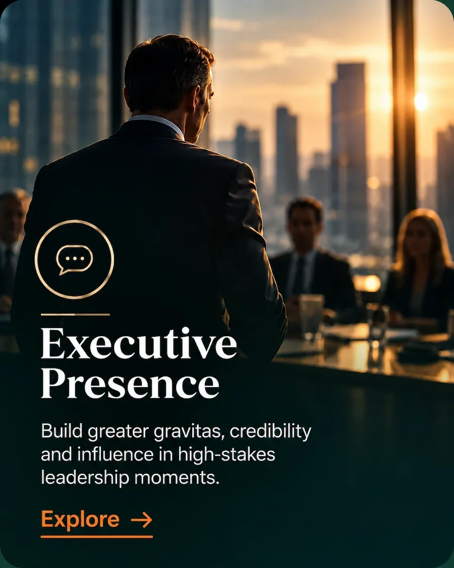 Senior leader presenting in a boardroom for executive presence coaching and leadership development.