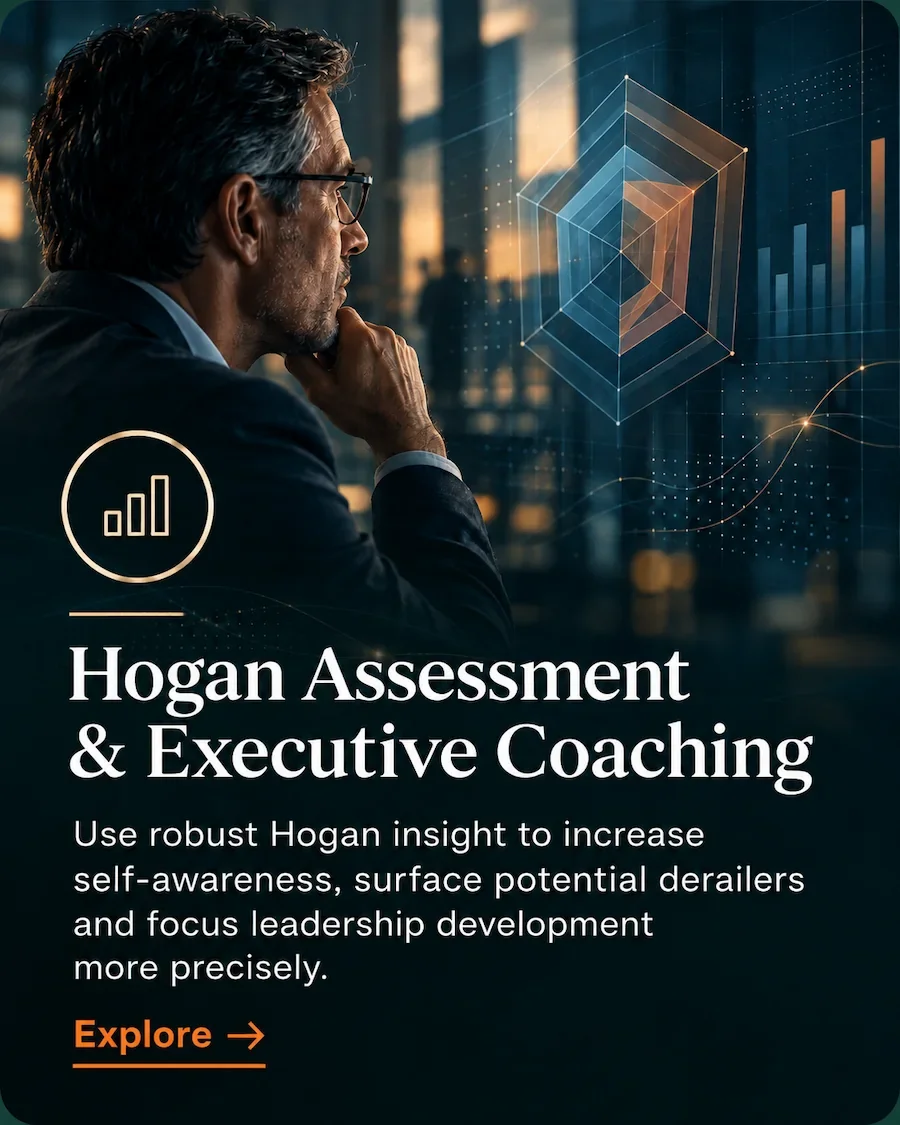 Senior executive reviewing behavioural assessment data during Hogan assessment and executive coaching.