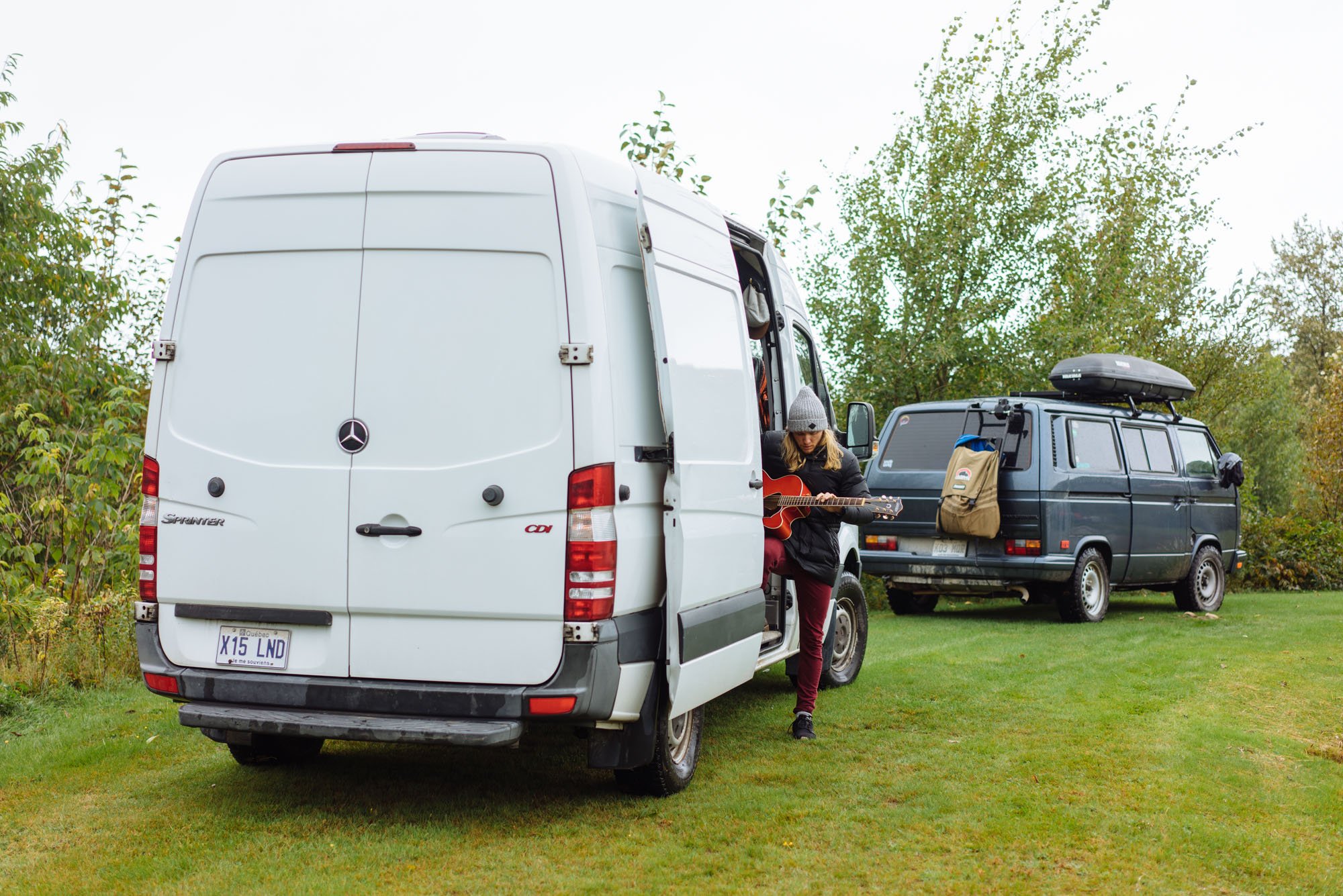  Anthony playing his guitar in his van 