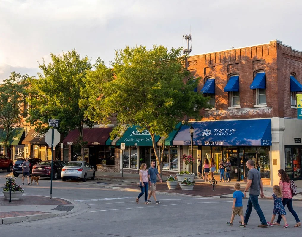 People walking around downtown Lee's Summit, Missouri. Sara Wilper Therapy is close by, offering telehealth.