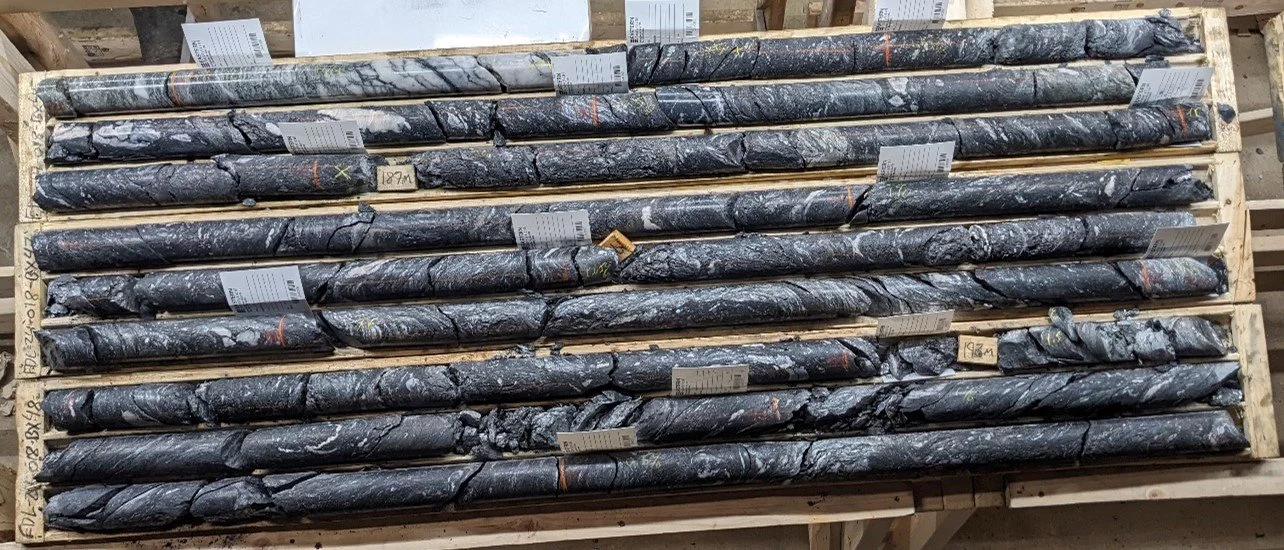 Figure 6: FDL-24-18 brecciated quartz at contact with graphitic shear zone. (184.15m - 184.65m downhole)