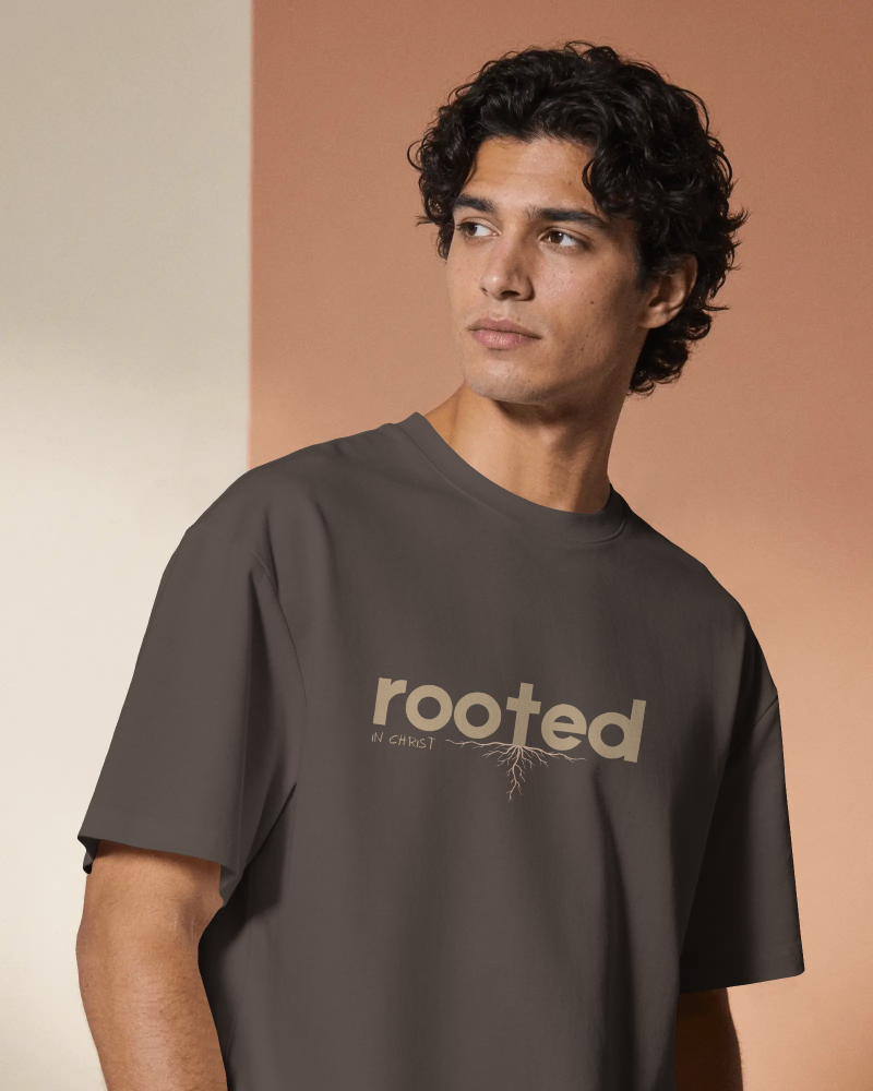 product-t-shirt-mockup-male-model-regular-fit-tee-two-tone-wall-professional-photography-04557.png