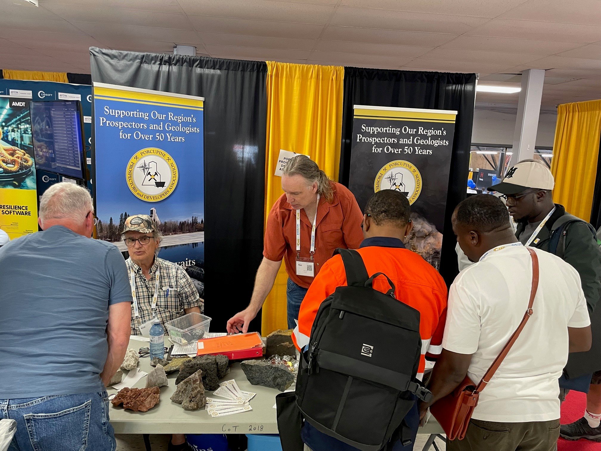 Andre Rochon (2025-2026 Treasurer-PPDA), (left), and Brian Polk (2026 President-PPDA), (right), at the Canadian Mining Expo 2026. Talking with attendees for the show.