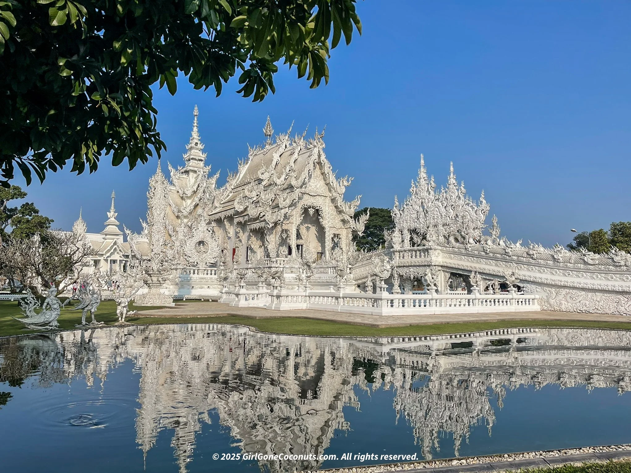 A view of the intricate and iconic White Temple in Chiang Rai, the perfect Instagram spot for every traveler.