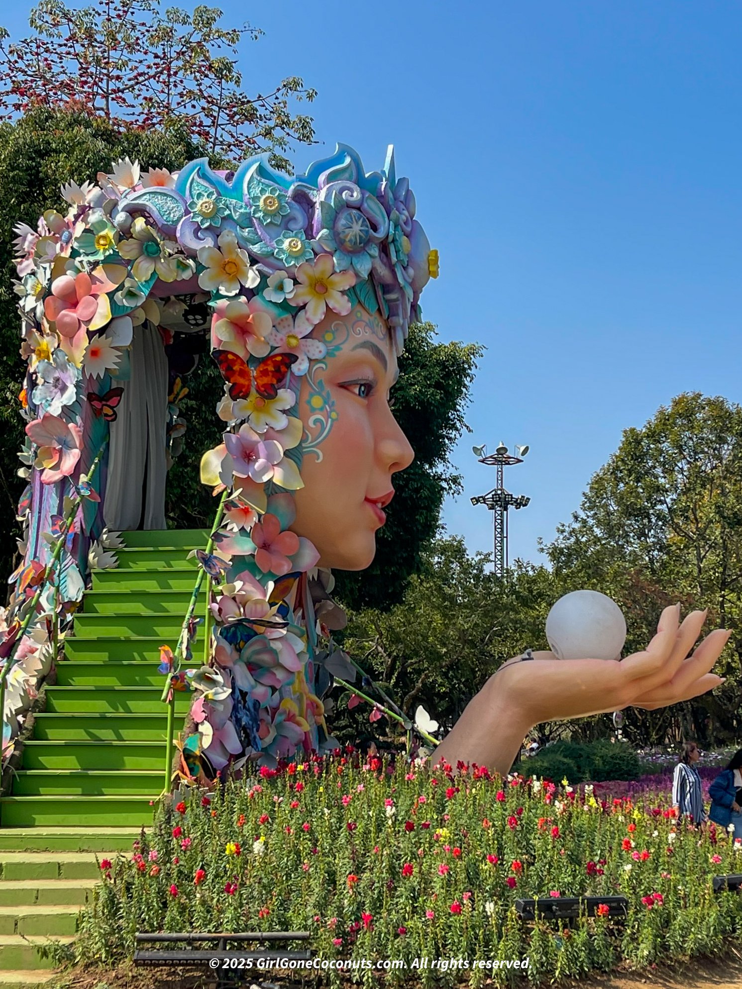 A floral statue and exhibit located the Garden of Reeds and Flower Festival in Chiang Rai.
