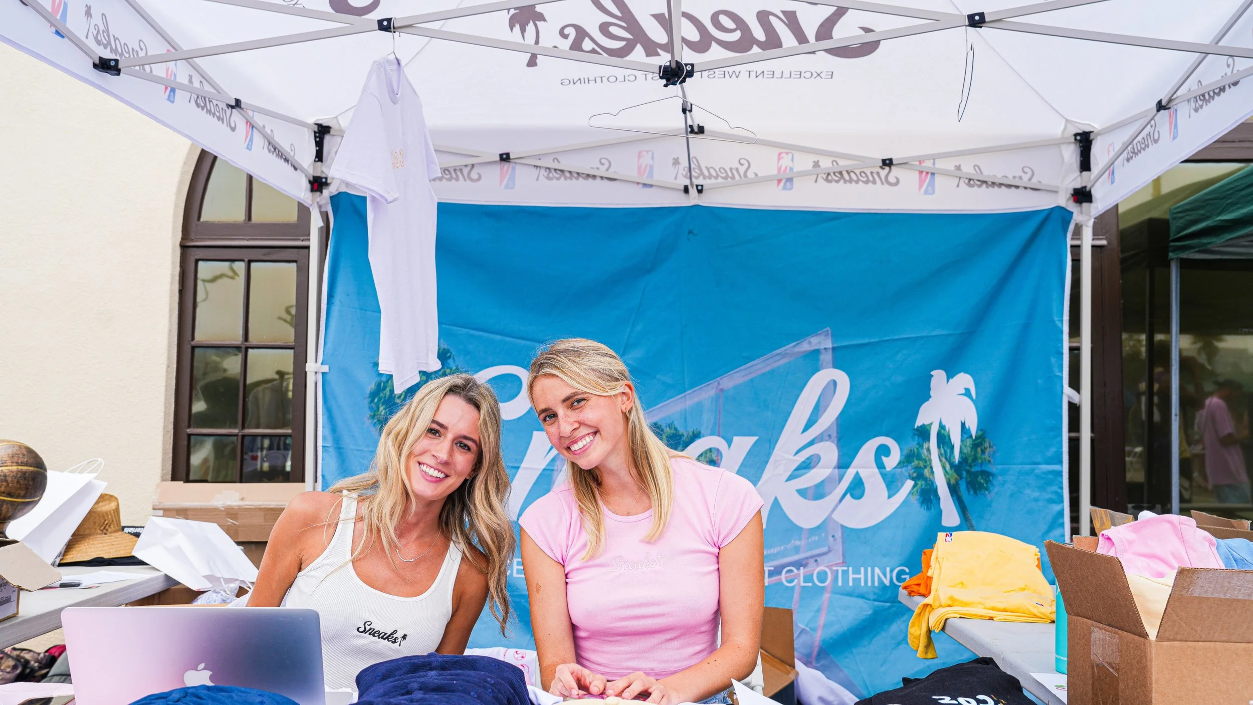 Sneaks Clothing Brand merch booth at Sneaks Summer Classic.