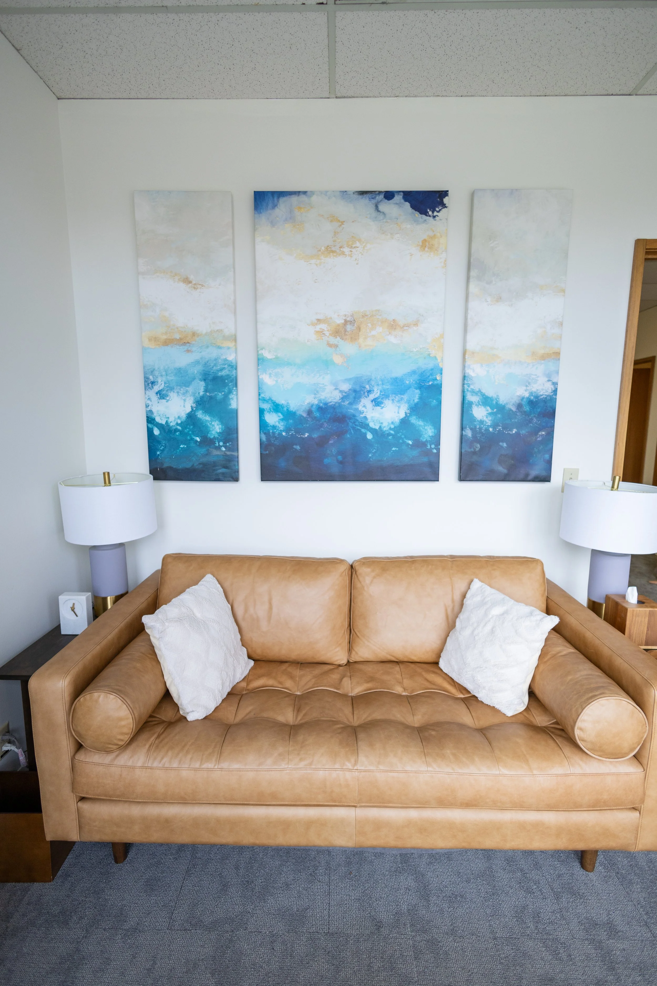 Comfortable brown couch for couples counseling in-person in Bellevue, Washington at Alignwell Modern Therapy