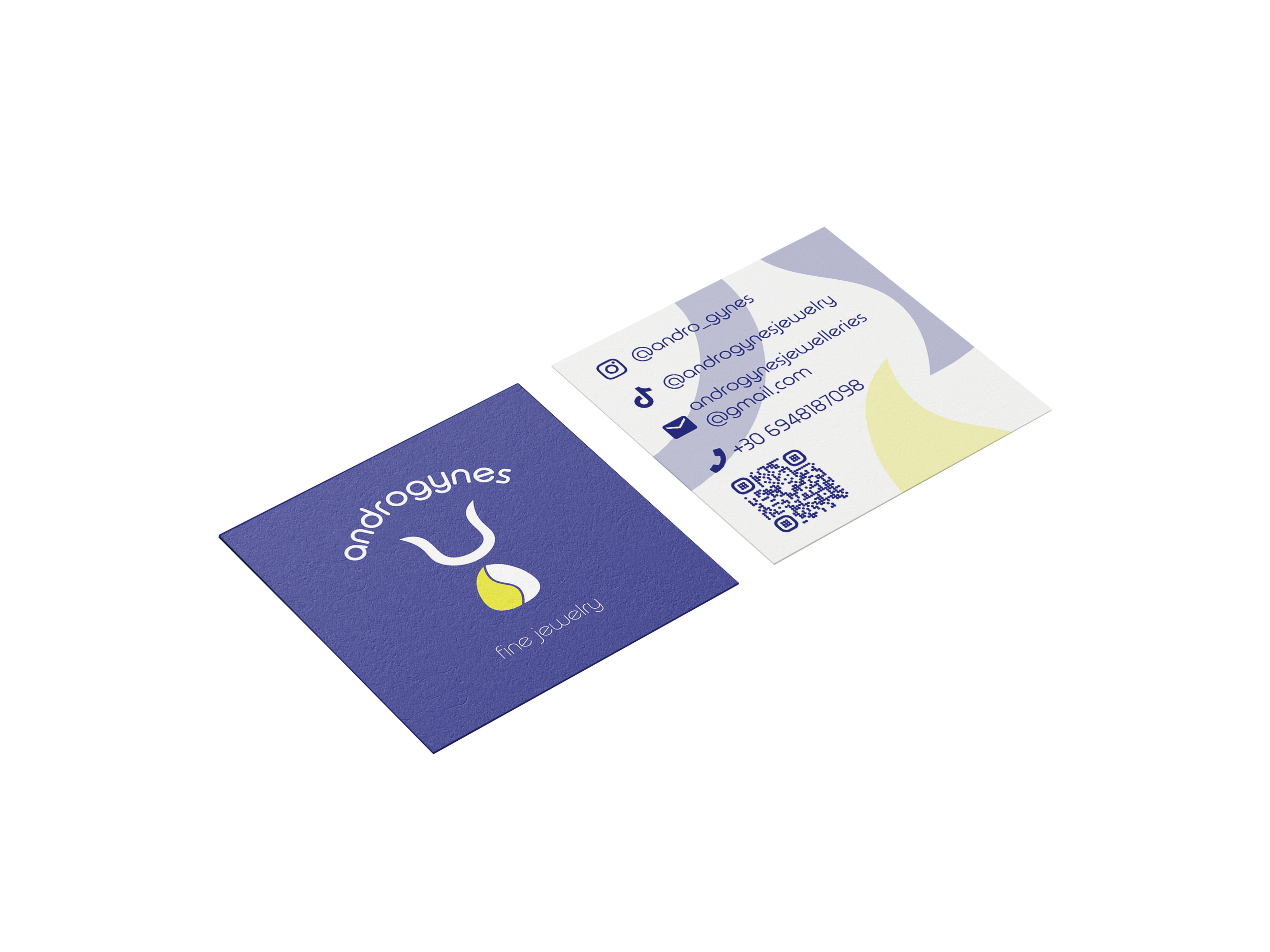 Business cards for Androgynes Fine Jewelry showing contact information, social media handles, and a QR code.