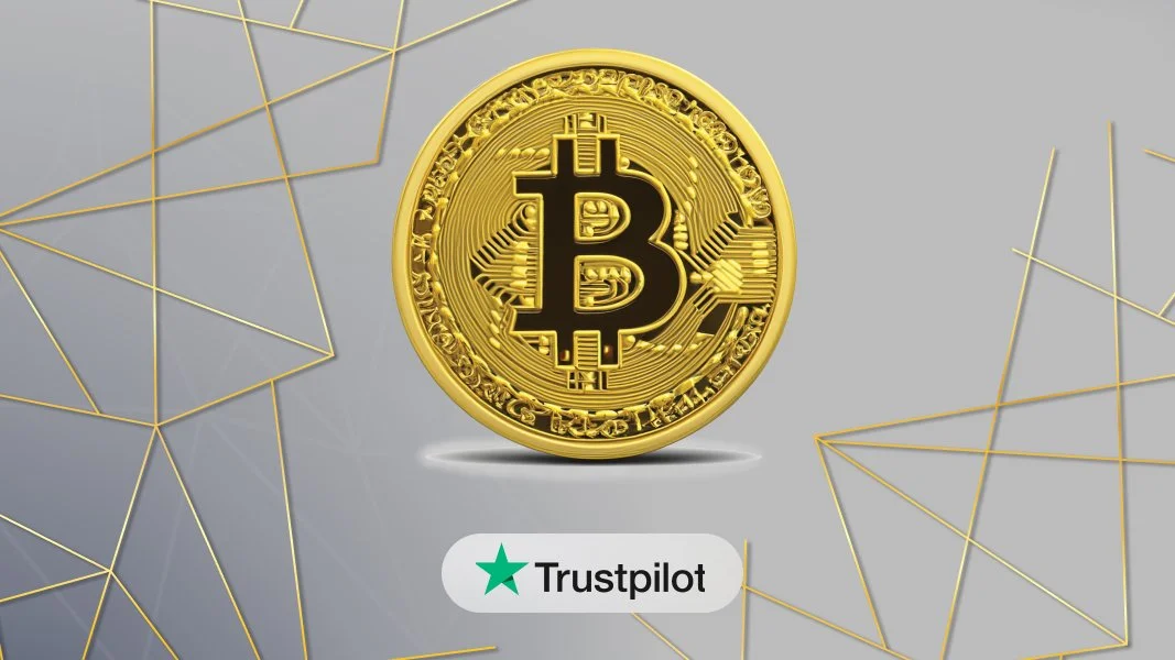 A large, gold-colored Bitcoin coin with engraved circuit patterns and the Bitcoin symbol in the center, placed on a gray background with gold geometric lines.