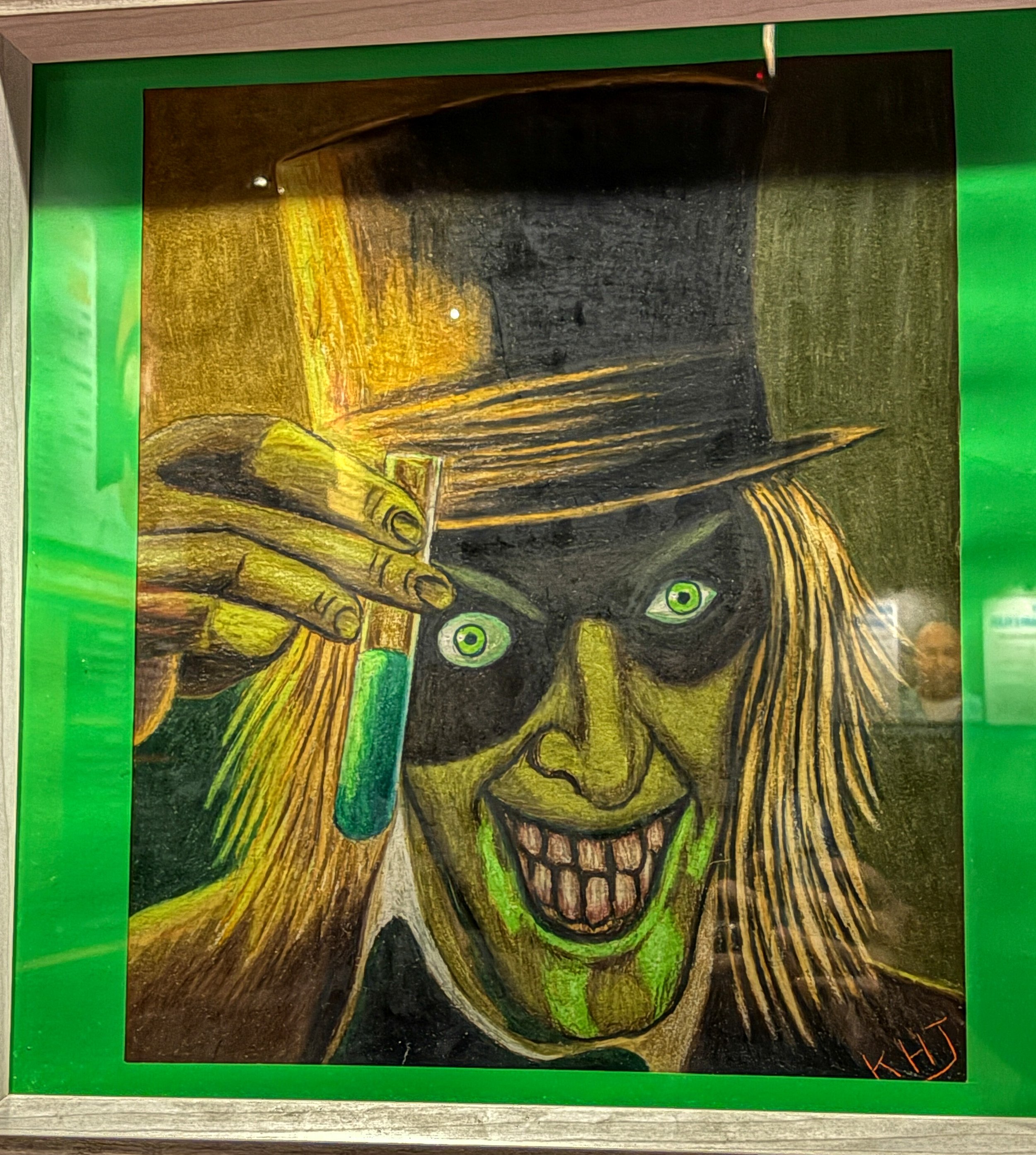 A painting of a hand holding a paintbrush, with a fly on the hand. The artist's signature is in the bottom right corner.