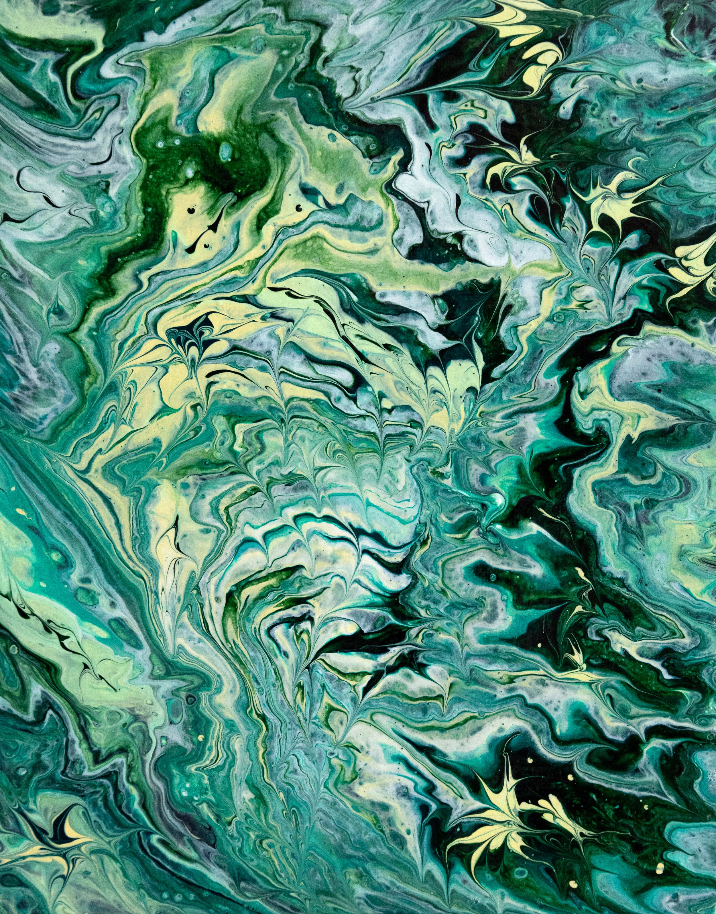 Swirling abstract painting with dominant shades of green, black, white, and hints of yellow, resembling fluid motion or marbling patterns.