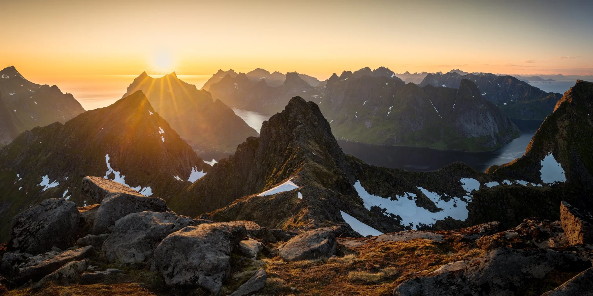 Midnight sun and view to the fjord at midnight