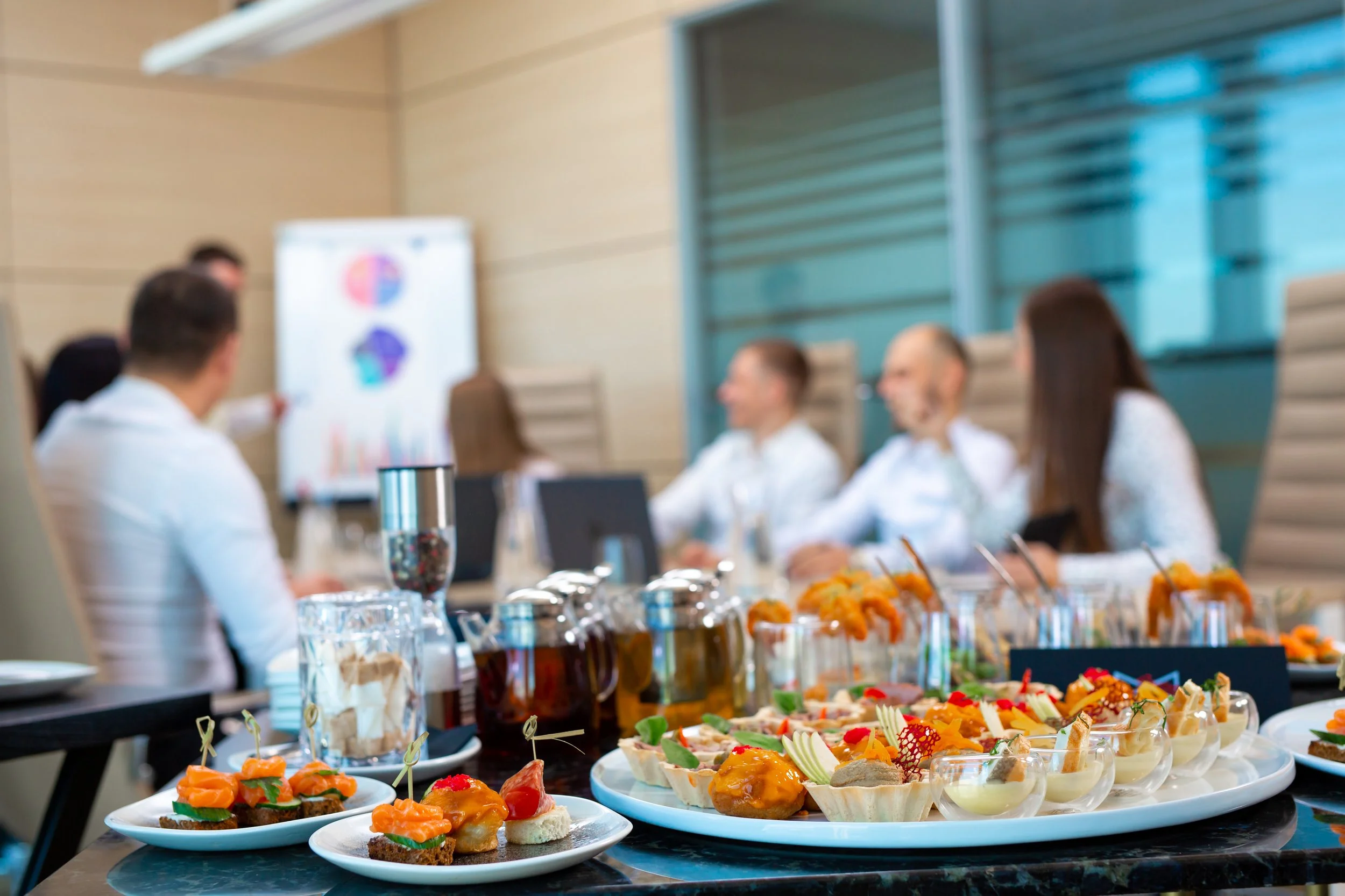 restaurant-waiter-serves-offsite-banquet-officexa.jpg