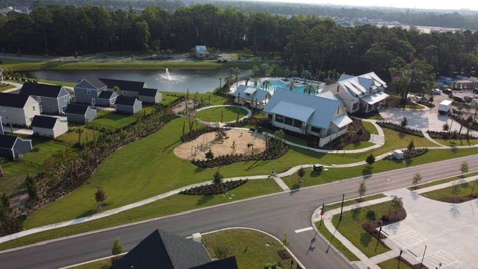 Aerial view of the playground, event lawn and fitness building at the Grand Dunes North amenity