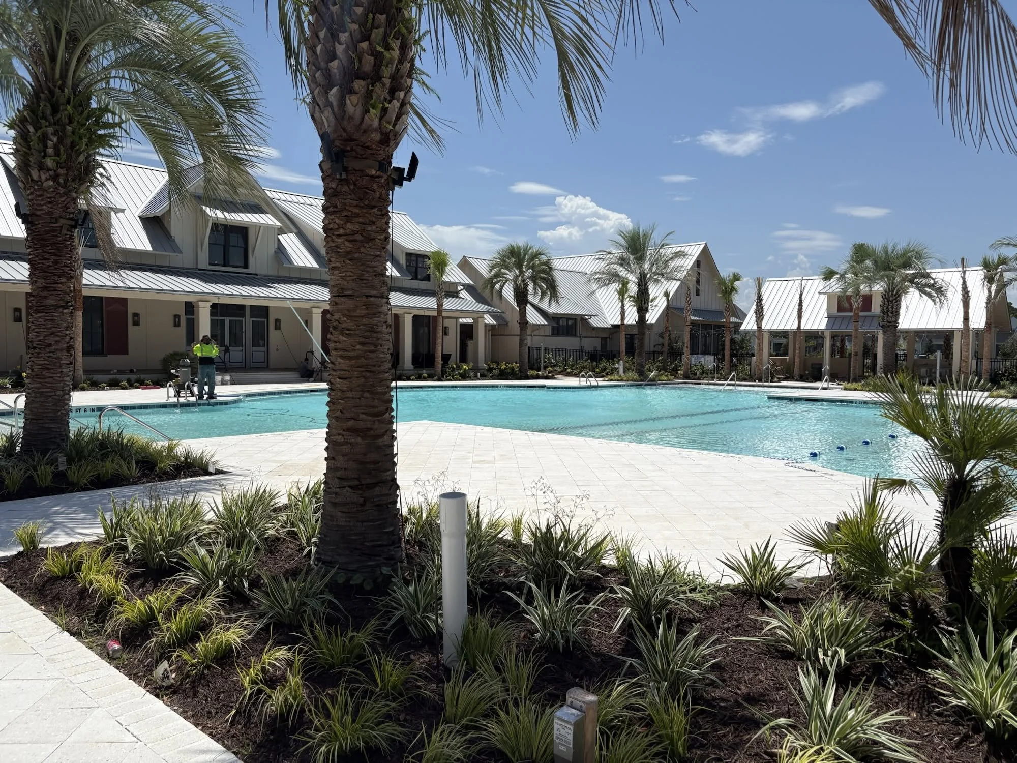 Resort style pool and pavilion with summer kitchen and grills at Grand Dunes North amenity