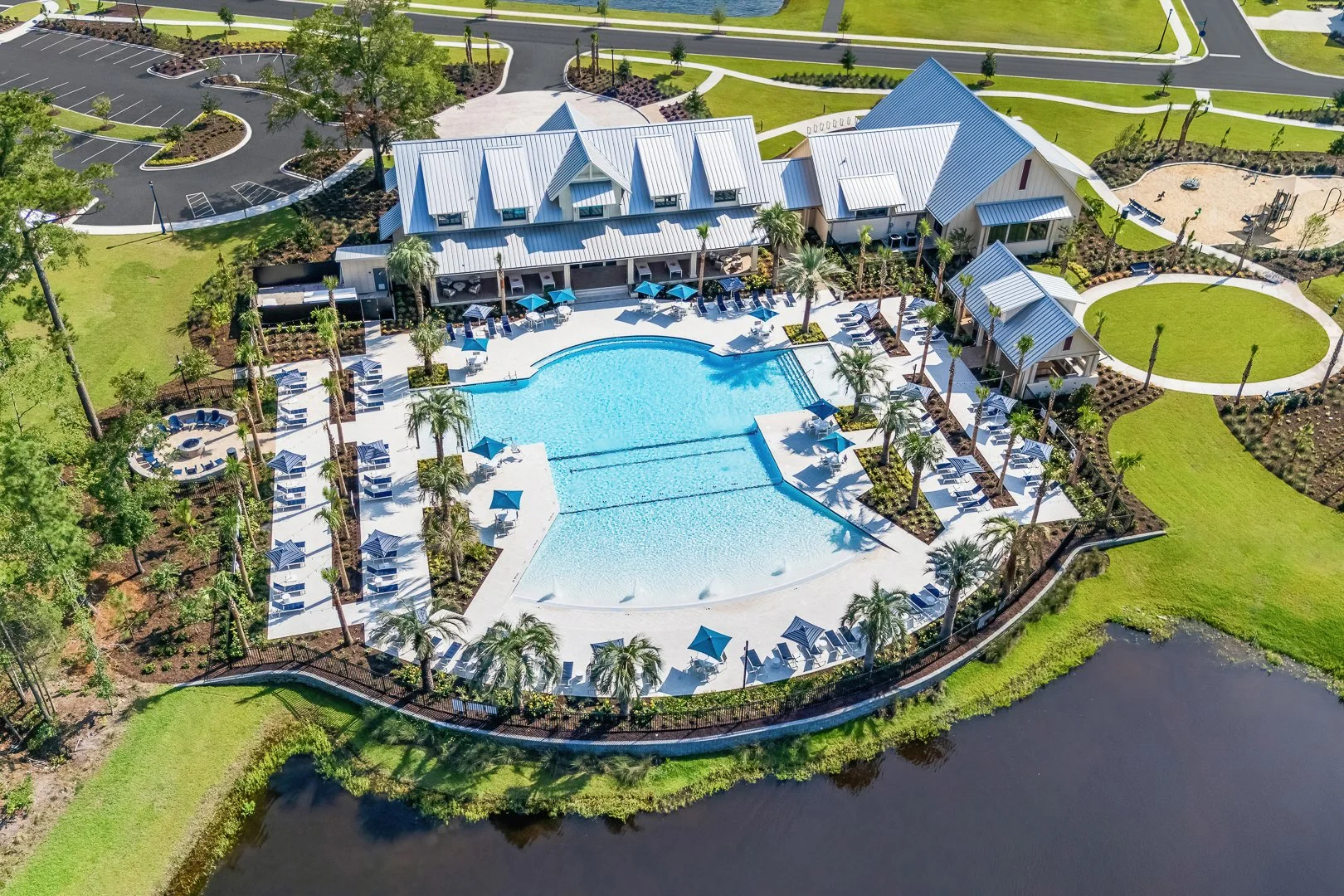 Aerial view of the pool, clubhouse, wellness center, firepit at Grand Dunes North Amenity Center