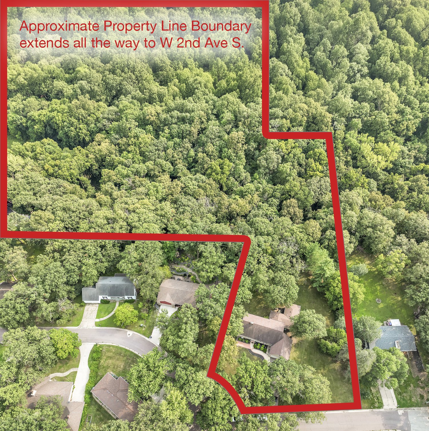 Aerial view of a residential neighborhood with houses, trees, and streets, with a red boundary line outlining a large wooded property. The outline extends to the street and indicates an area extending to West 2nd Avenue South.