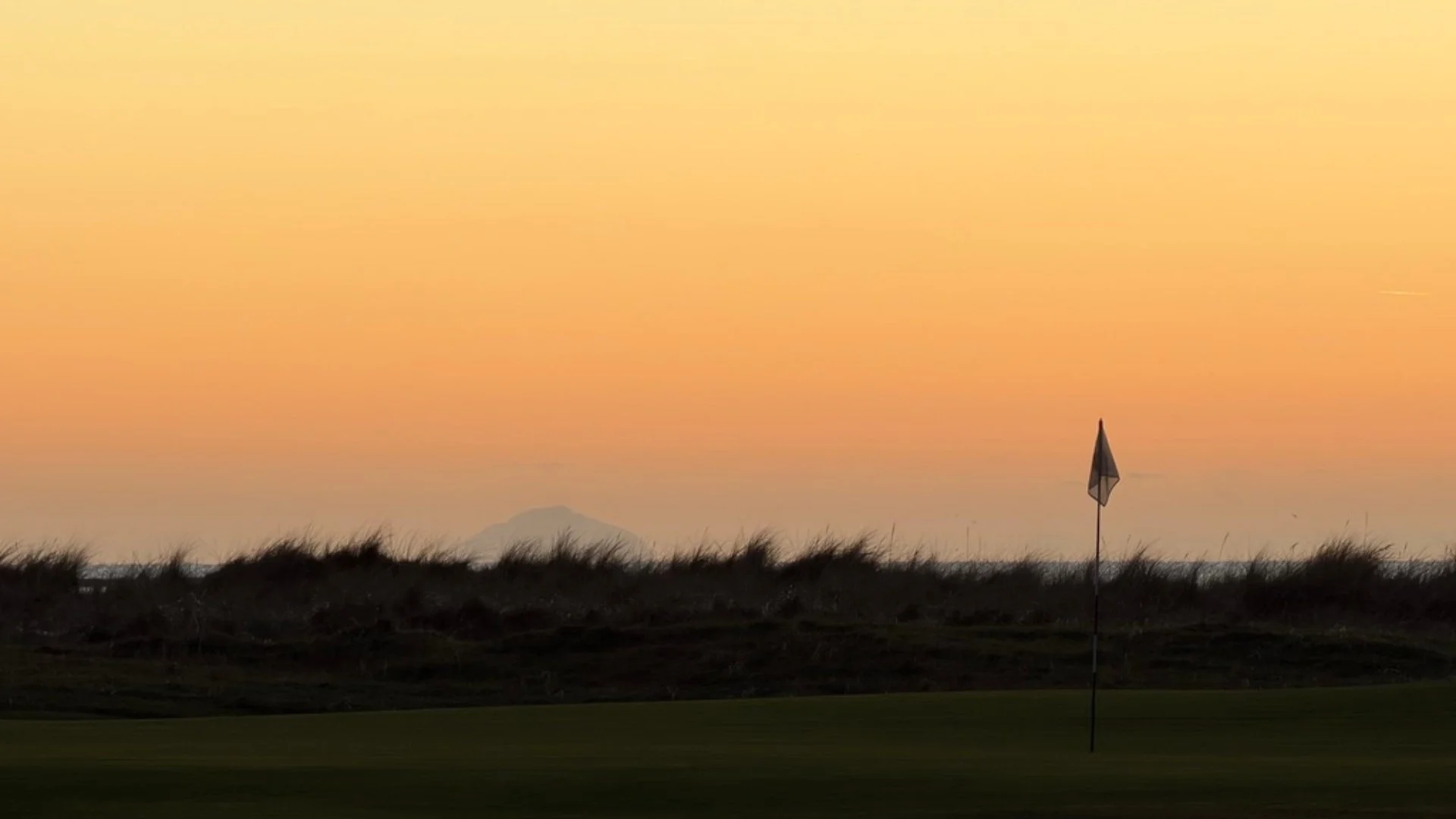 Sunset over Royal Troon Golf Course from Blackrock House.