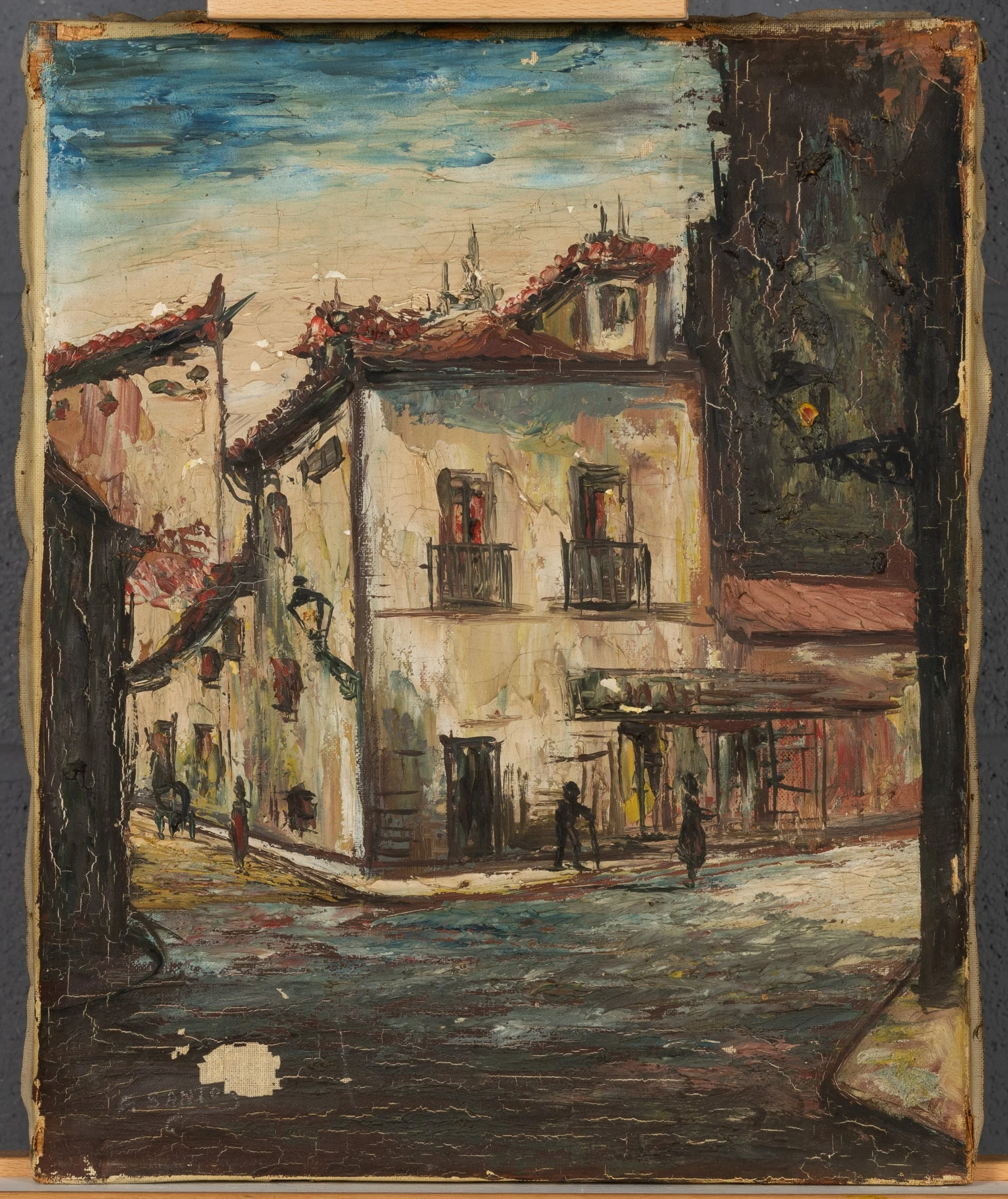 A painting of a house on a street corner, held on an easel, under normal illumination, ie. under normal viewing conditions with indirect ambient lighting