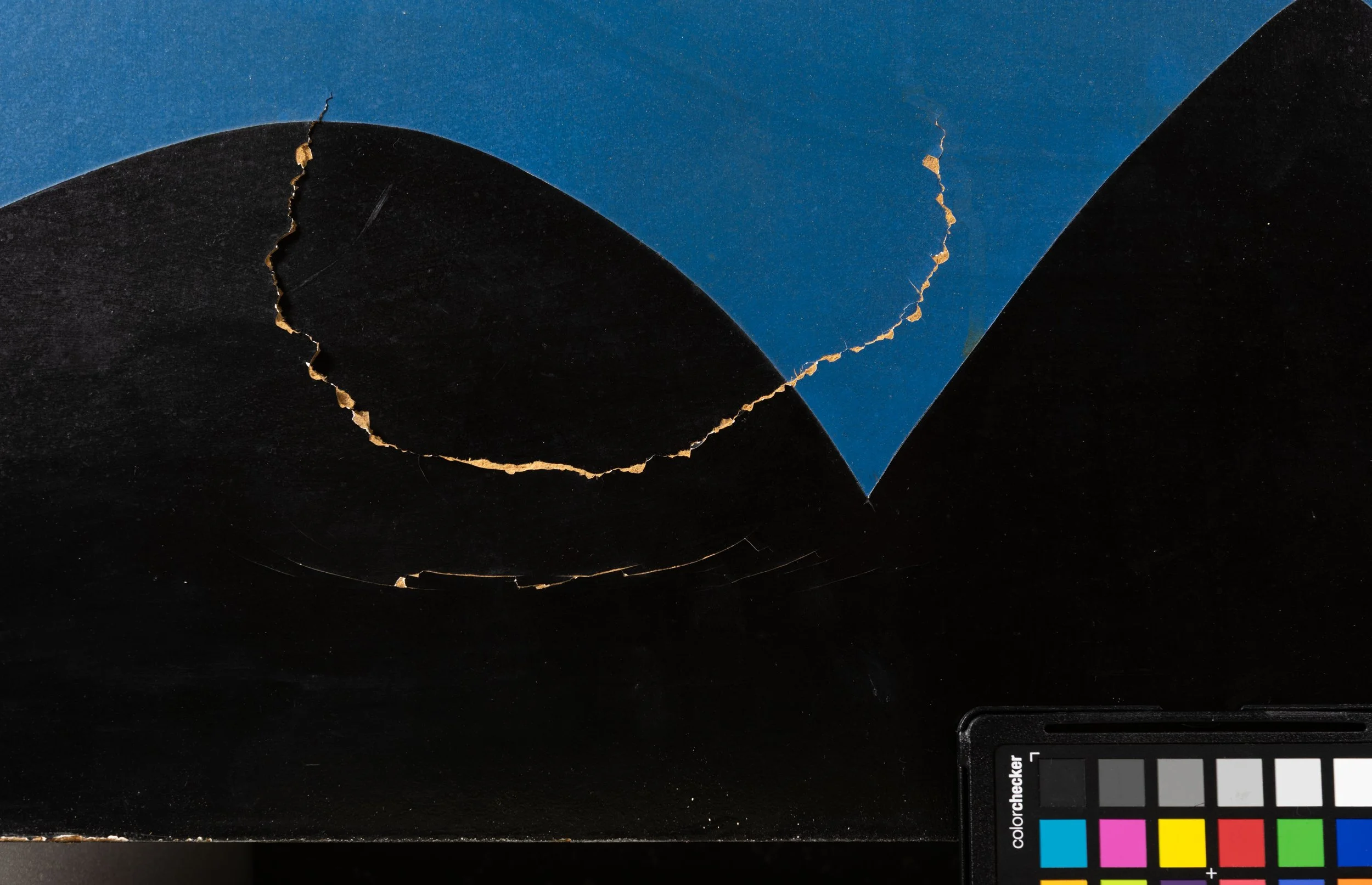 Masonite tear on Panel B, Before Treatment