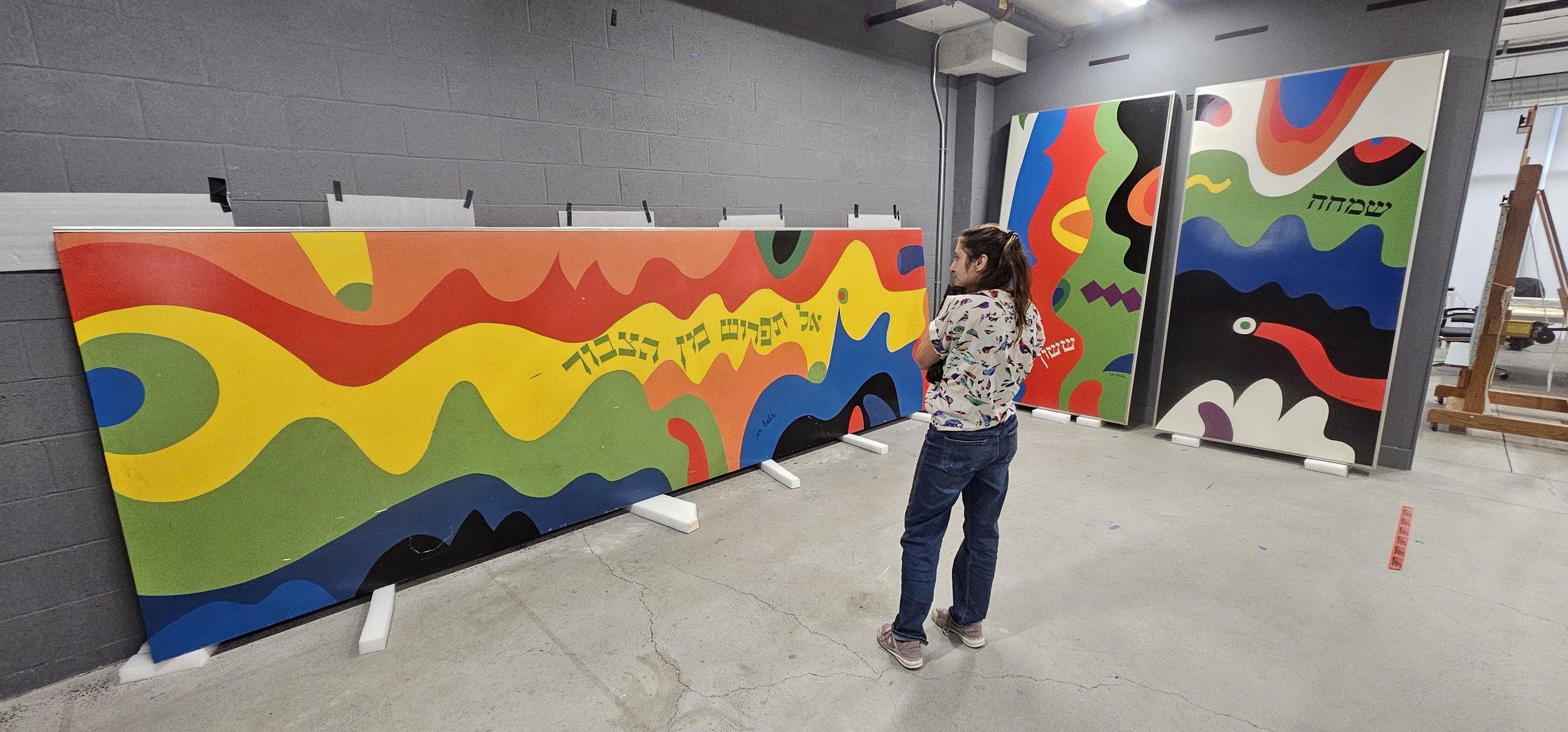 All three panels in the studio