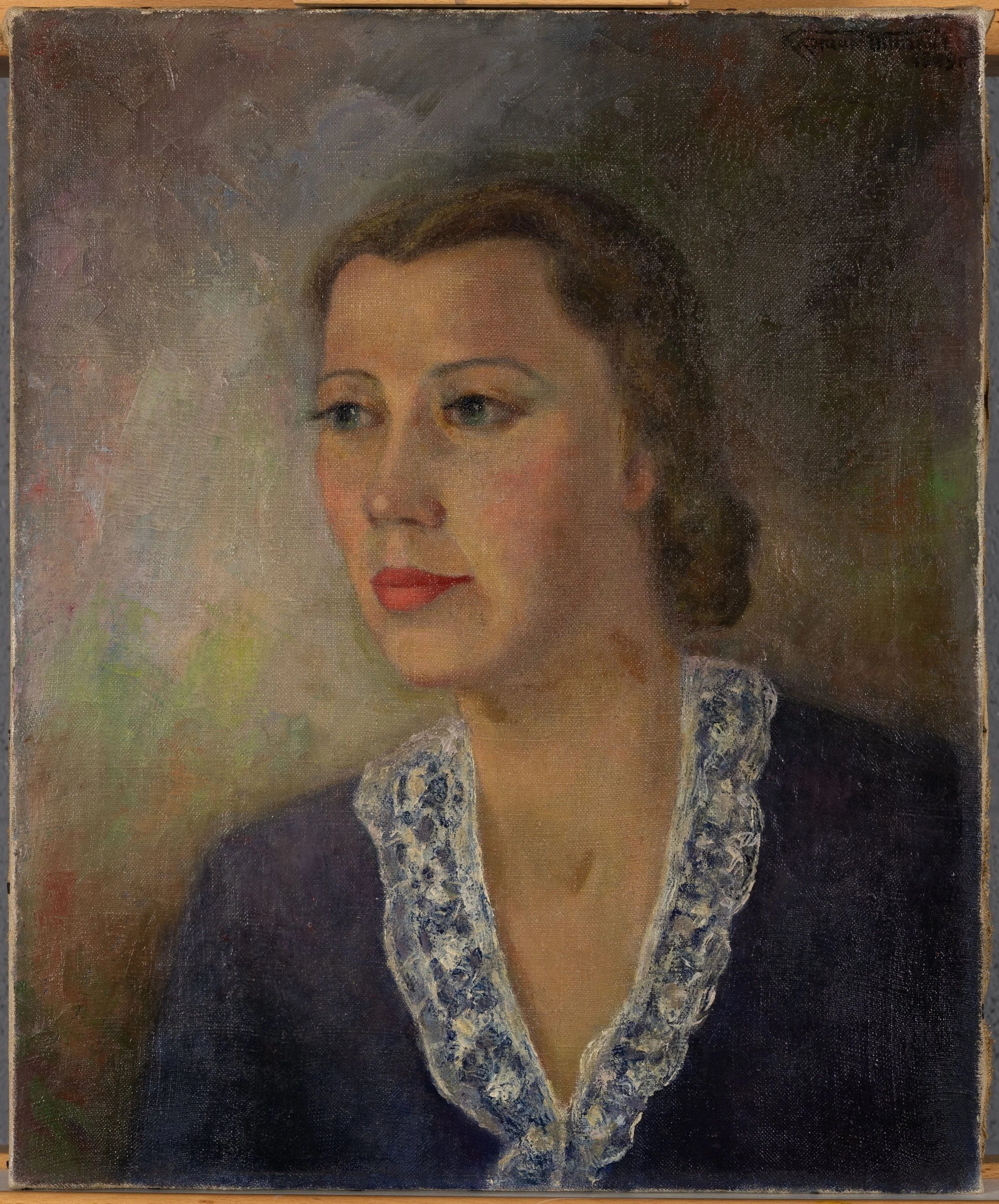 Portrait painting of a light-skinned woman with her hair is tied in a low bun. She is wearing a blue dress with a white lace collar.