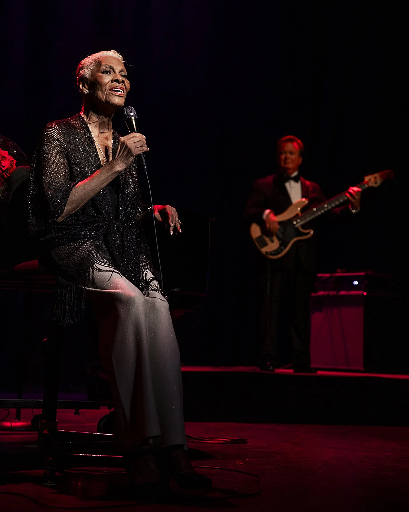 A photo of Dionne Warwick sitting at a piano at The Egg Performing Arts Center