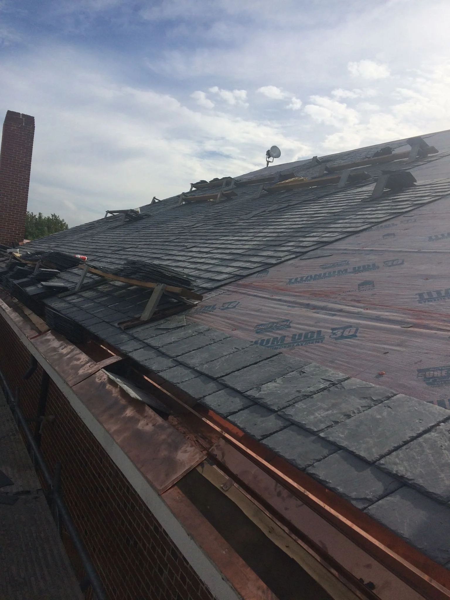 Slate Roof Replacement in Progress