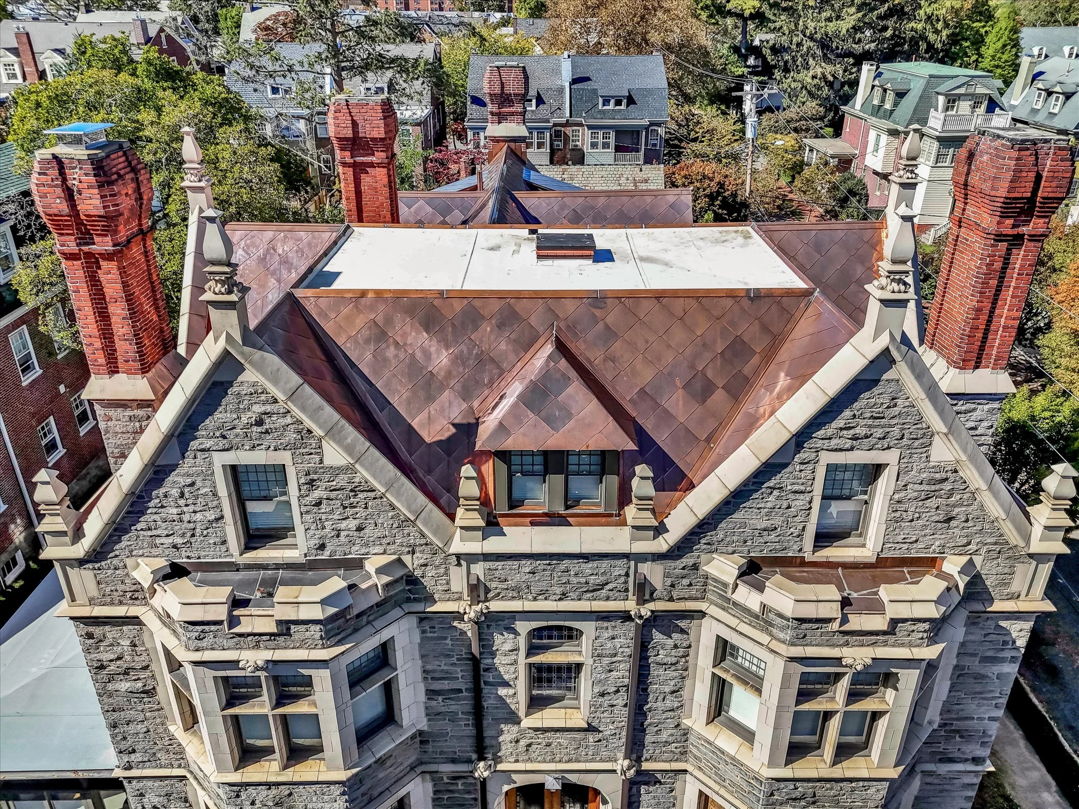 Front view of copper tile roof on historic home