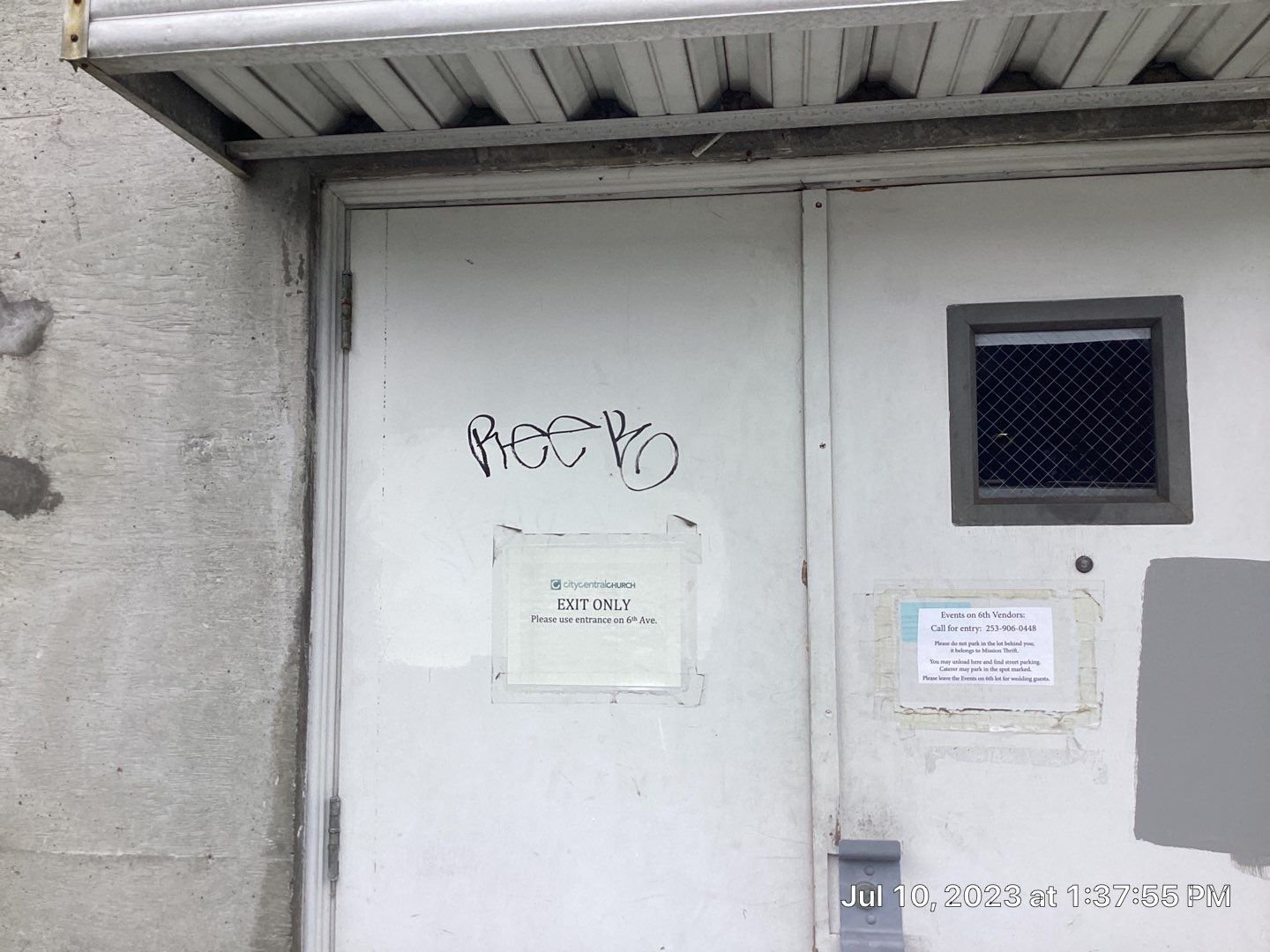 graffiti-removal-service-on-metal-door-Tacoma.jpg
