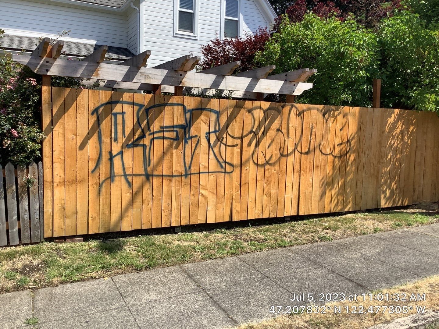 graffiti-removal-service-on-wood-fence-Tacoma.jpg