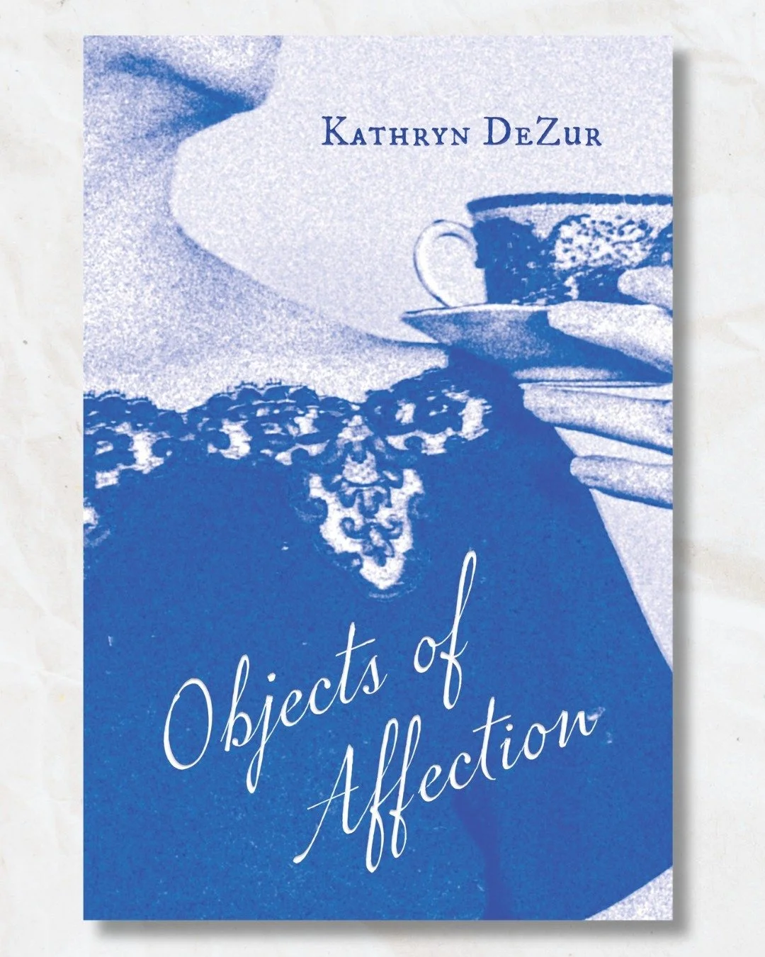 Cover reveal!

Today, we're so excited to reveal the cover for Objects of Affection, our forthcoming memoir in essays by Kathryn DeZur.

The book will be out in April, with advanced copies available at the 2026 @awpwriter conference in Baltimore, MD.