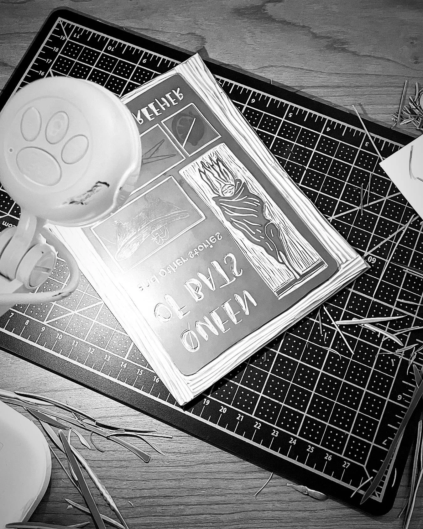 Progress shot of @ellie.anna.pasquale carving the cover of Queen of Bats by @rachelreeher, forthcoming this March. 

We can&rsquo;t wait to test print this beauty! 👑

#linoprint #printmakersofinstagram #artistbook