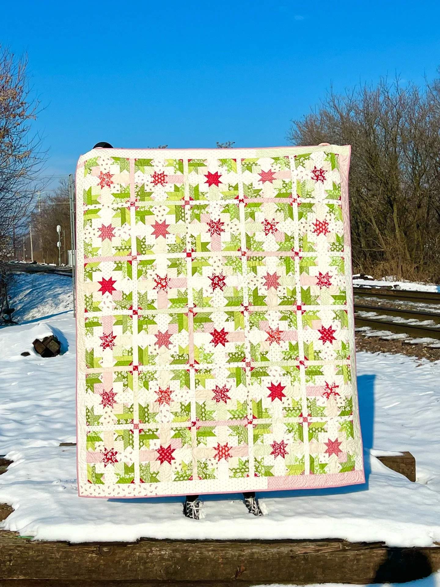 I think this might be my actual new favorite Christmas quilt (and I have a lot of Christmas quilts and I love them all so this is really saying something)! It feels fresh and the colors and piecing have a sparkle to them. It&rsquo;s a mix of fabrics 