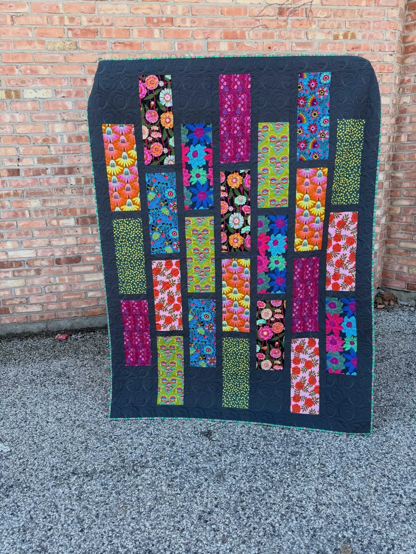 Finally, some sunshine on a day when we could get quilted pics! This lovely is a new kit at the shop featuring an assortment of vibrant Anna Maria prints and a Bella solid for the background. The pattern is Claudette by Villa Rosa. 

We&rsquo;re alwa