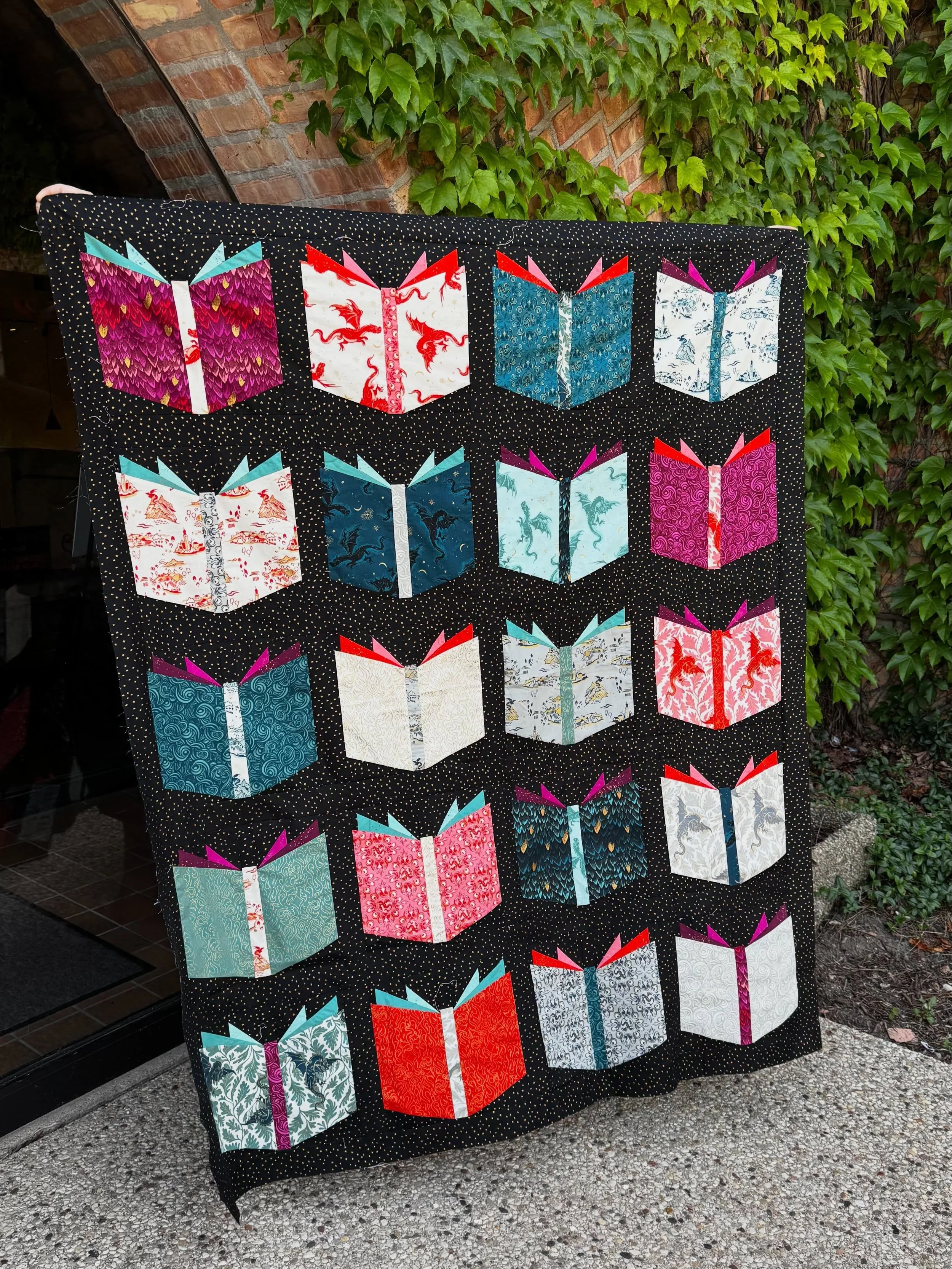 I&rsquo;m impatient and I can&rsquo;t wait to share this one so we&rsquo;ll post it again after it&rsquo;s quilted&hellip;this is the Warman Cozy version of the Fireglow Book Nerd Quilt Kit! 

We changed up the background to the Mini Starry with the 