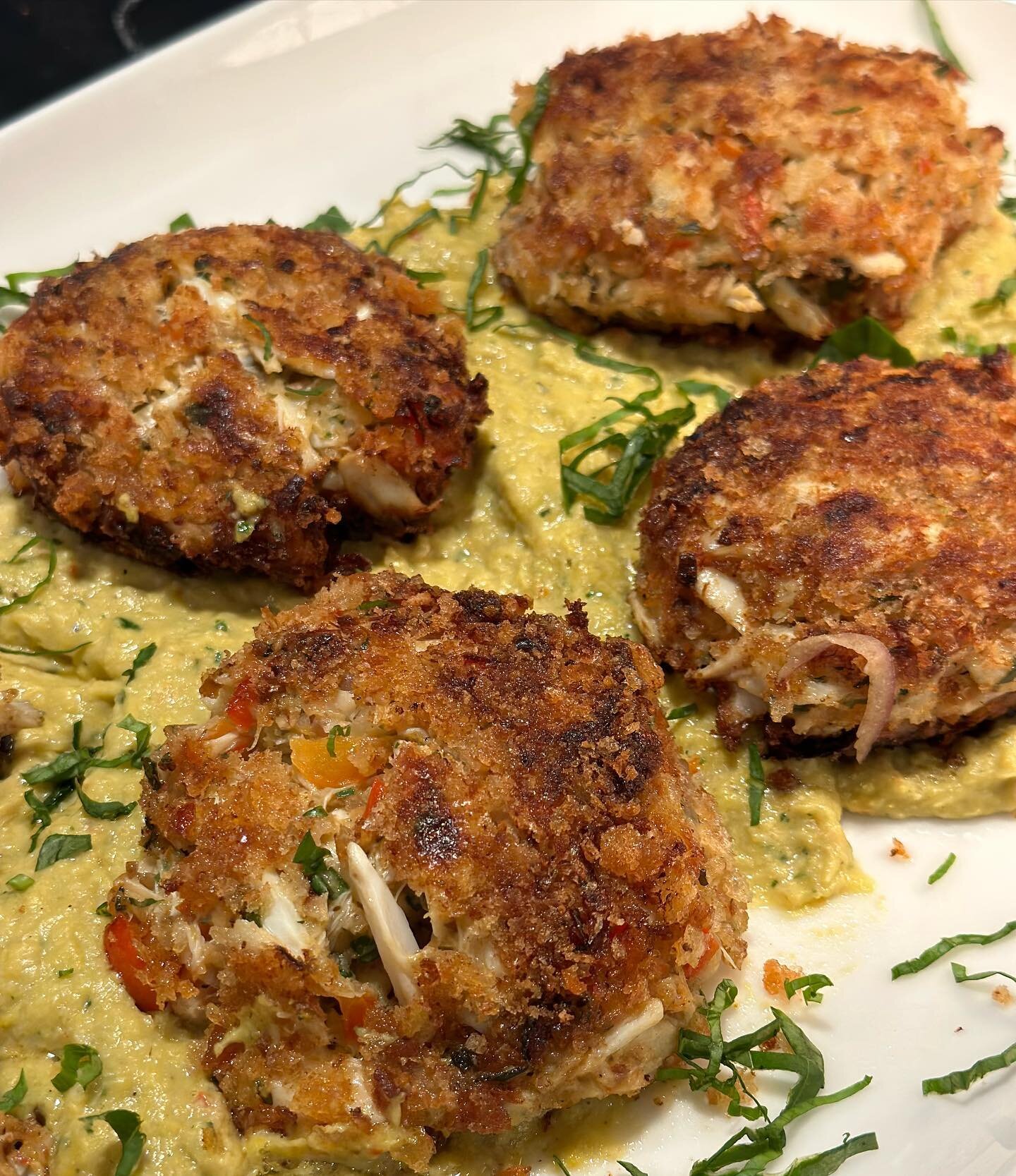 This is a great summer dinner choice for 2 or for your next dinner party!!! Jumbo lump crab cakes with a basil corn pur&eacute;e!! The sweetness of the corn combined with the crabmeat is a wonderful combination of flavors!! Place  your order at www.e