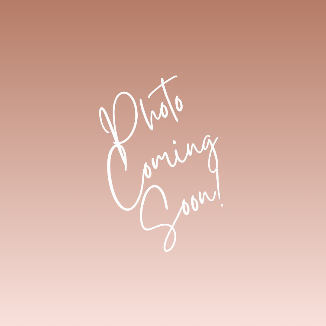A gradient pink background with white cursive text that says, "Photo Coming Soon!"