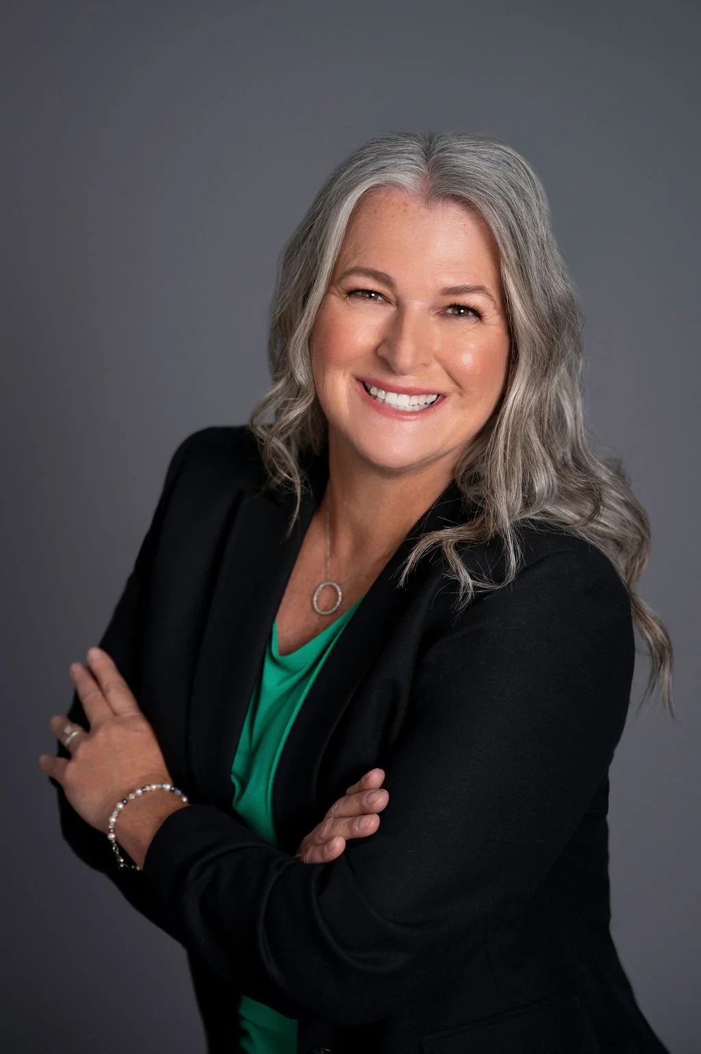 Reno Realtor Alice Lavergne with folded arms smiling