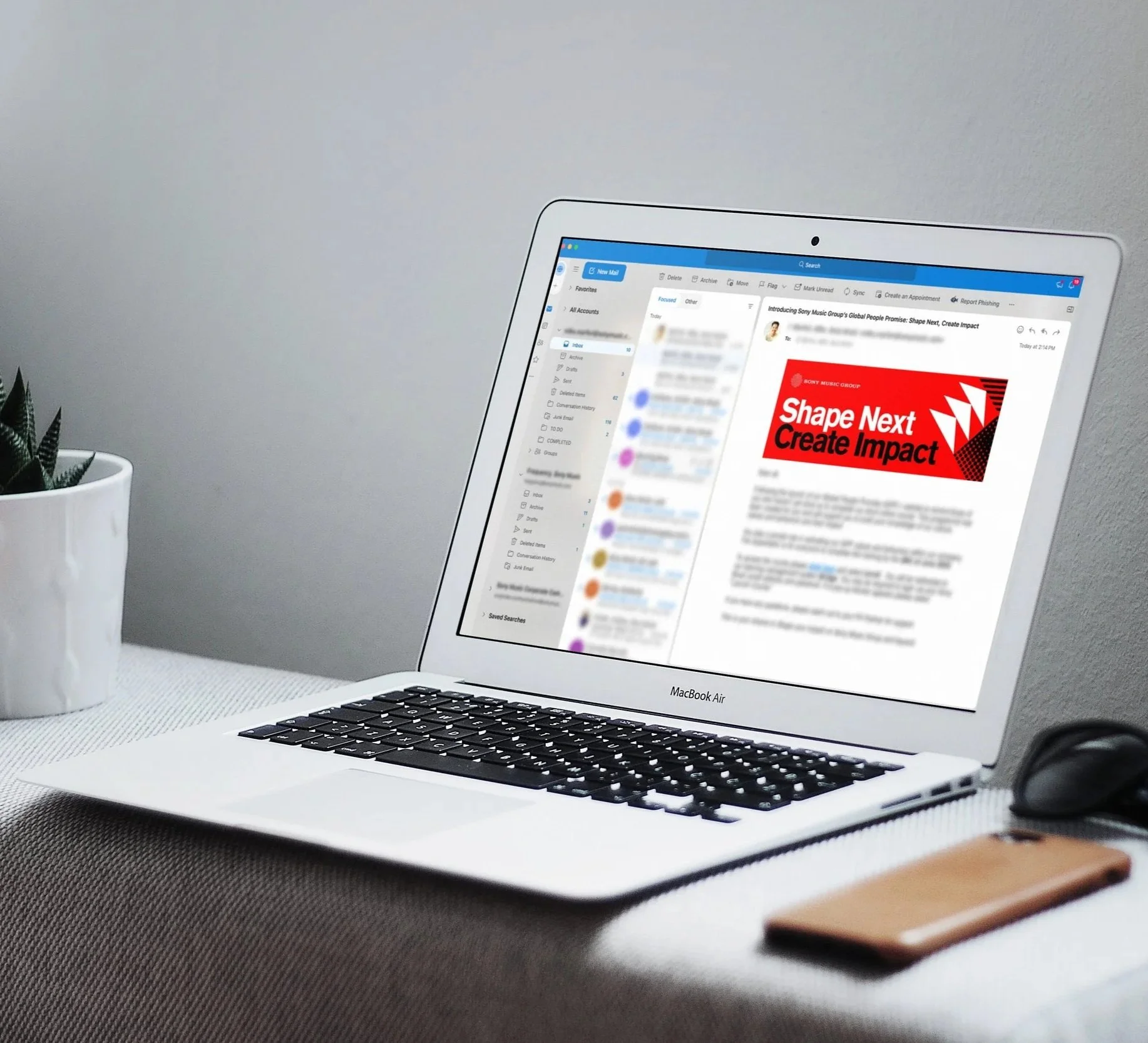 MacBook+Air+on+Table+Mockup.jpg